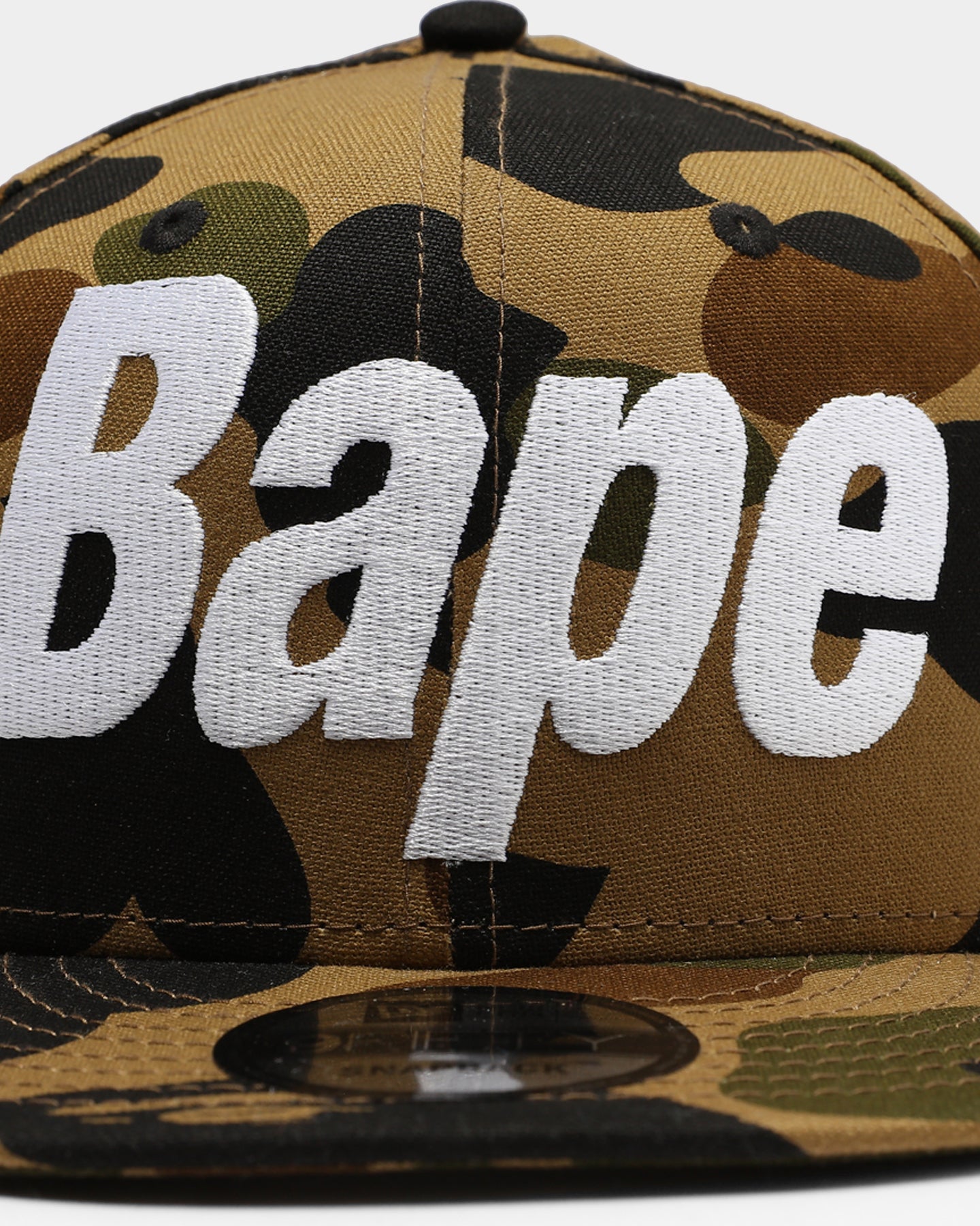 BAPE x New Era 1st Camo 9FIFTY Snapback Hat - Green Camouflage Adjustable Baseball Cap for Streetwear Fashion & Urban Lifestyle