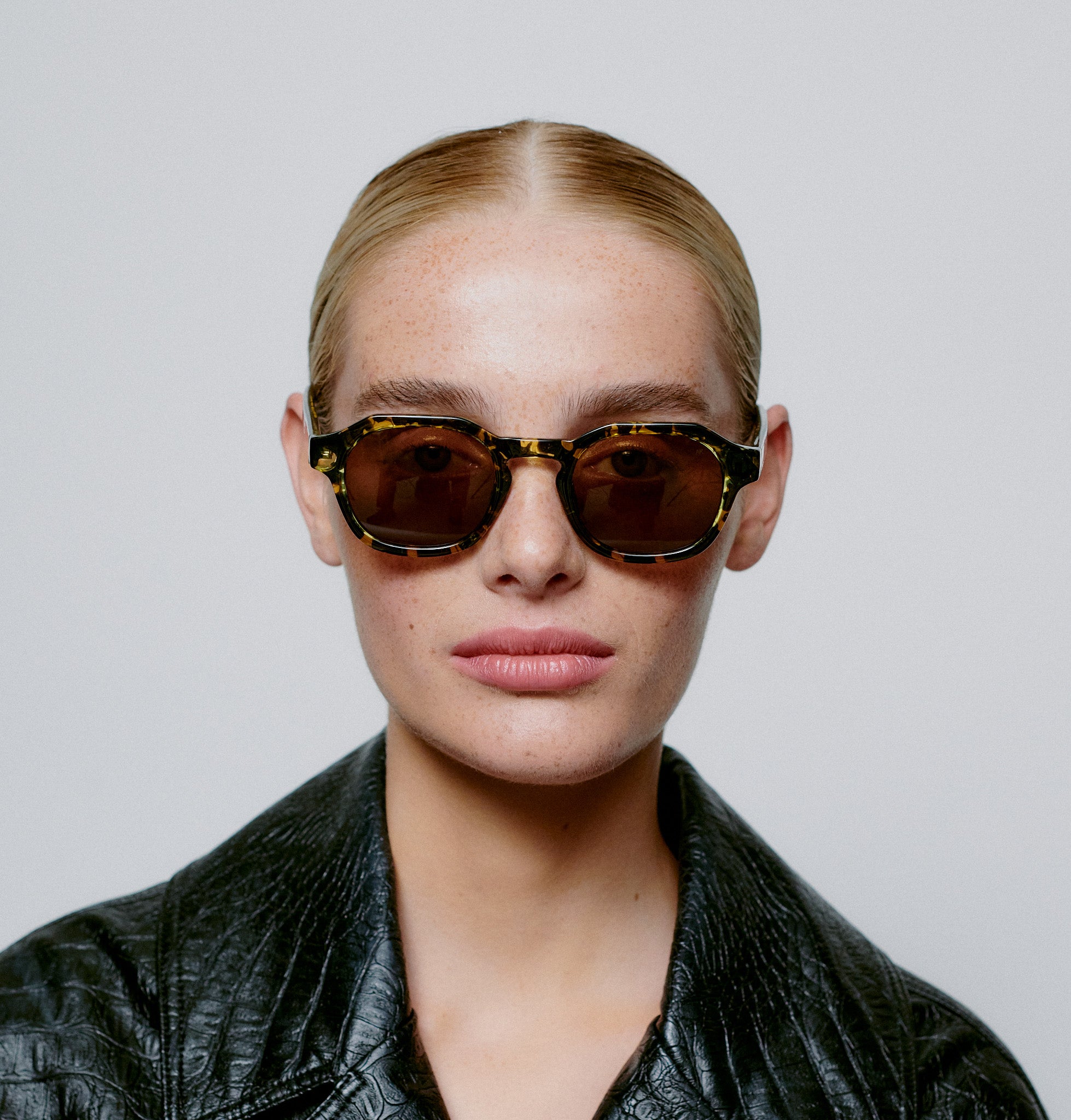 A. Kjaerbede Black Yellow Transparent Zan Sunglasses - Stylish UV Protection for Outdoor Activities, Beach, and Driving