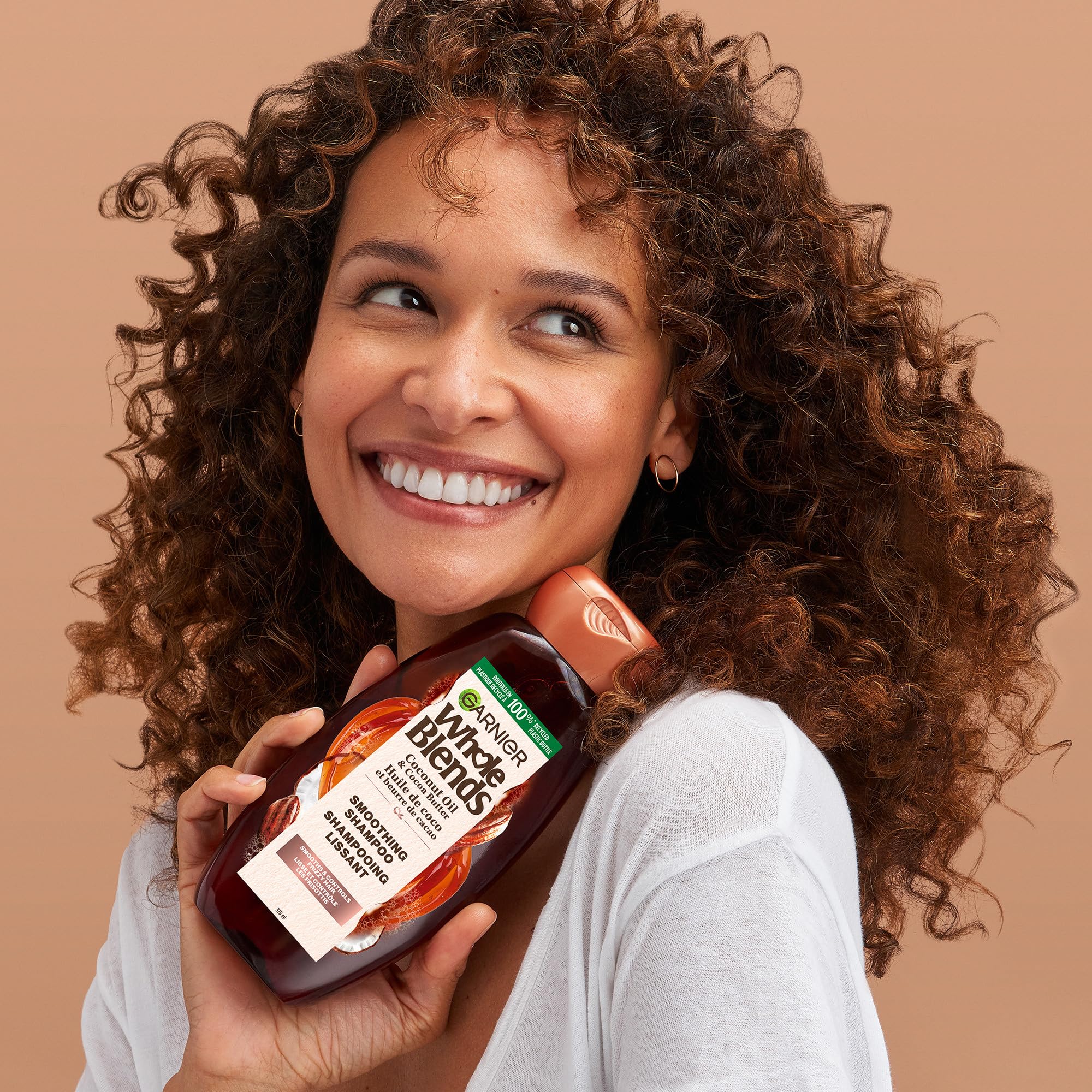 Garnier Whole Blends Frizzy Smoothing Conditioner with Coconut Oil & Cocoa Butter Extracts - 22 Fl Oz for Dry, Frizzy Hair - Hydrating & Nourishing Hair Care - Perfect for Daily Use & Salon-Like Smoothing at Home