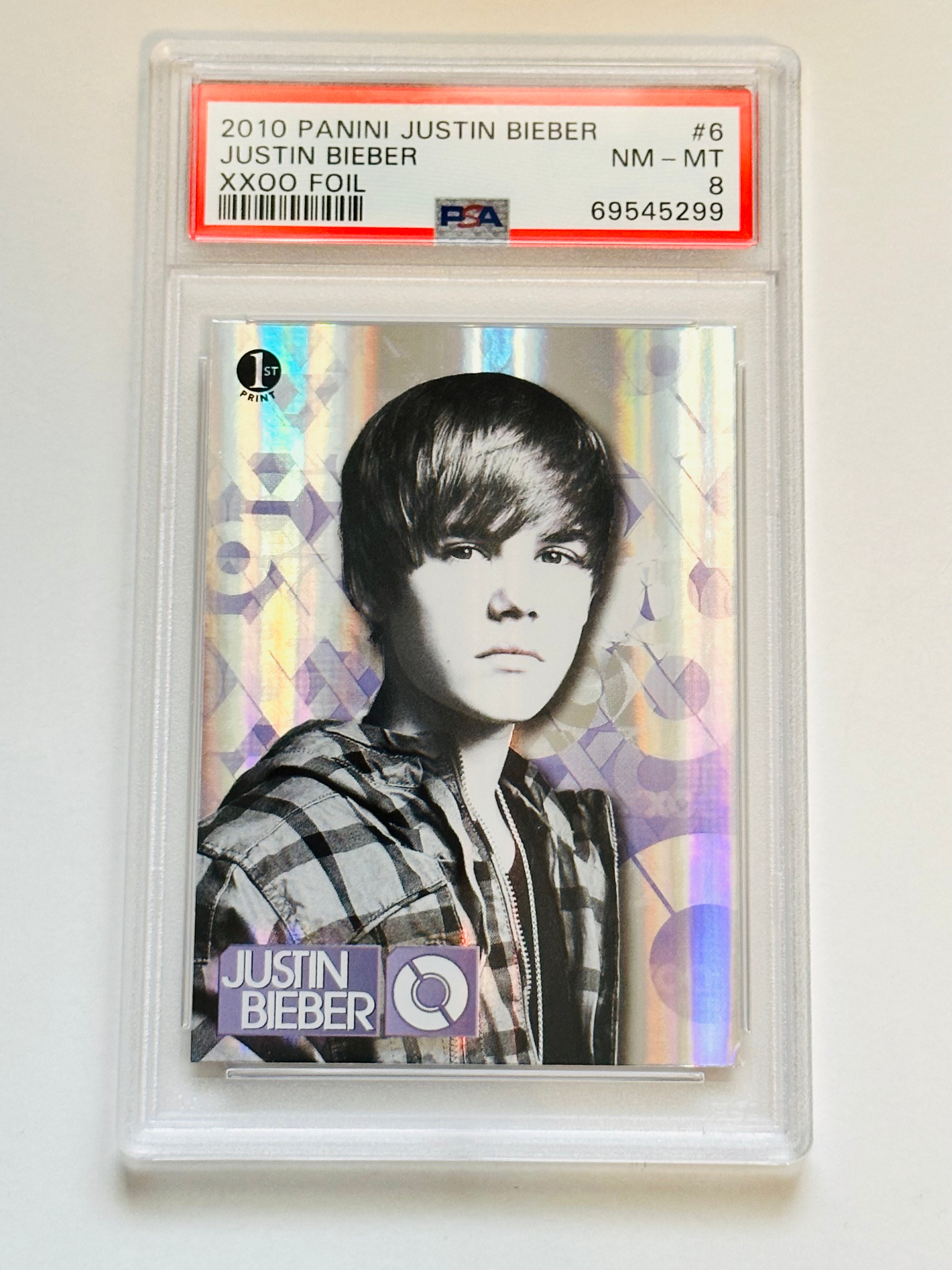Justin Bieber 2010 Panini Foil XXOO Insert PSA 8 Graded Trading Card - Perfect for Collectors, Fans & Sports Memorabilia Enthusiasts