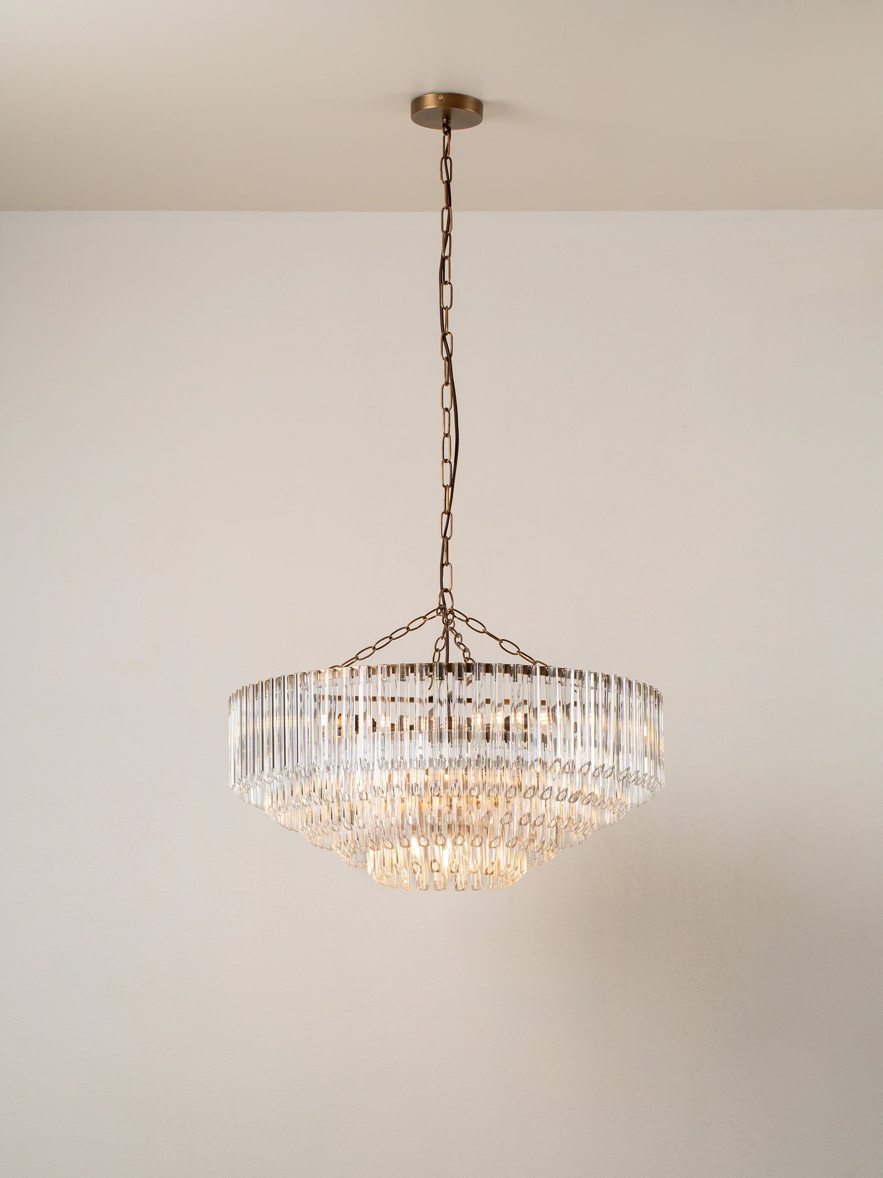 Petalia 9-Light Aged Brass and Clear Glass Tube Wide Chandelier - Elegant Dining Room Lighting for Farmhouse & Modern Decor