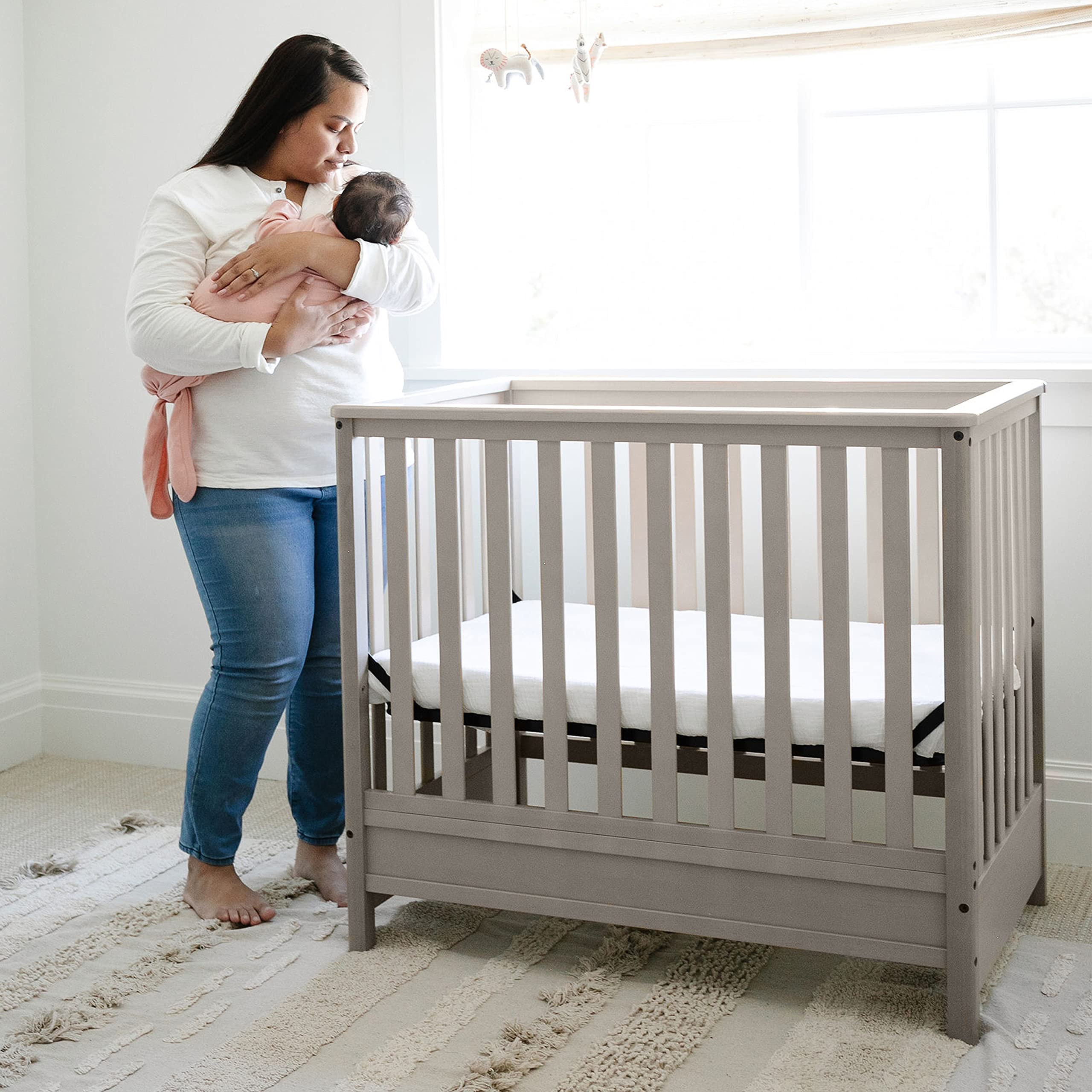 Storkcraft 5-in-1 Convertible Mini Crib with Bonus 2.75