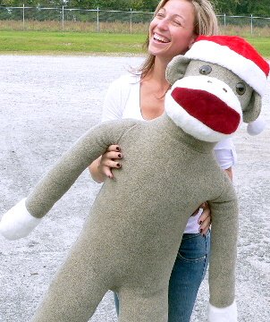 54-Inch Giant Plush Sock Monkey with Removable Santa Hat | American Made Soft Stuffed Animal Toy | Perfect for Christmas Decor, Nursery Room, and Cozy Gift Ideas