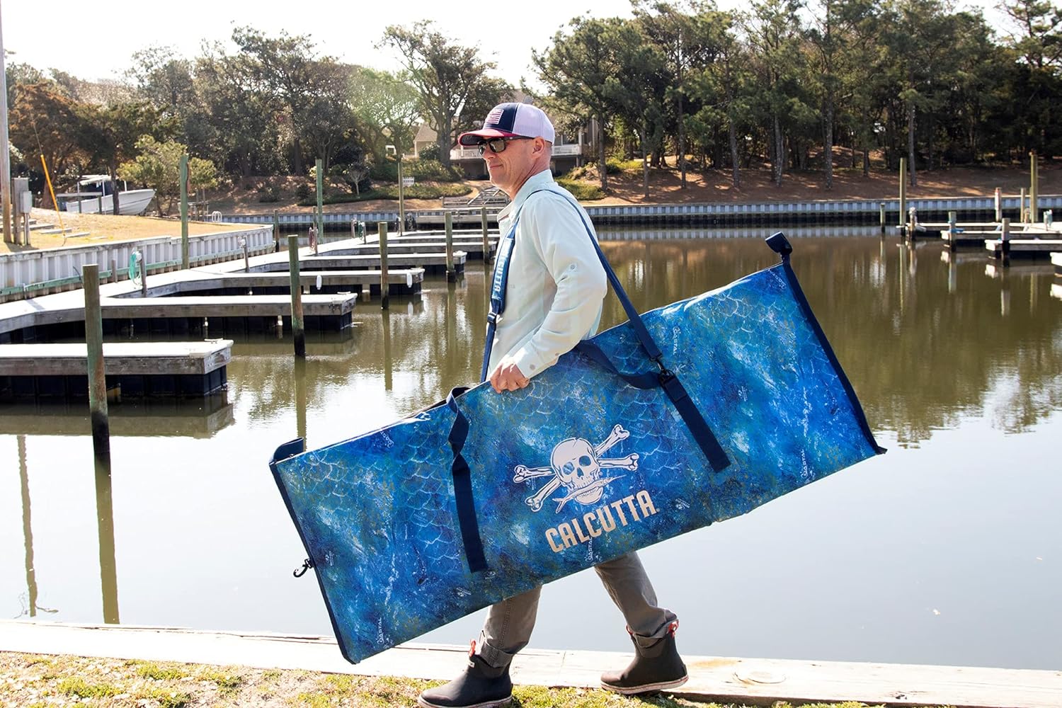Calcutta Pack Fish Cooler 68x24 - Mossy Oak Shoreline Camo - Heavy Duty Insulated Cooler for Fishing, Hunting & Outdoor Adventures - Perfect for Beach, Boat & Camping Trips