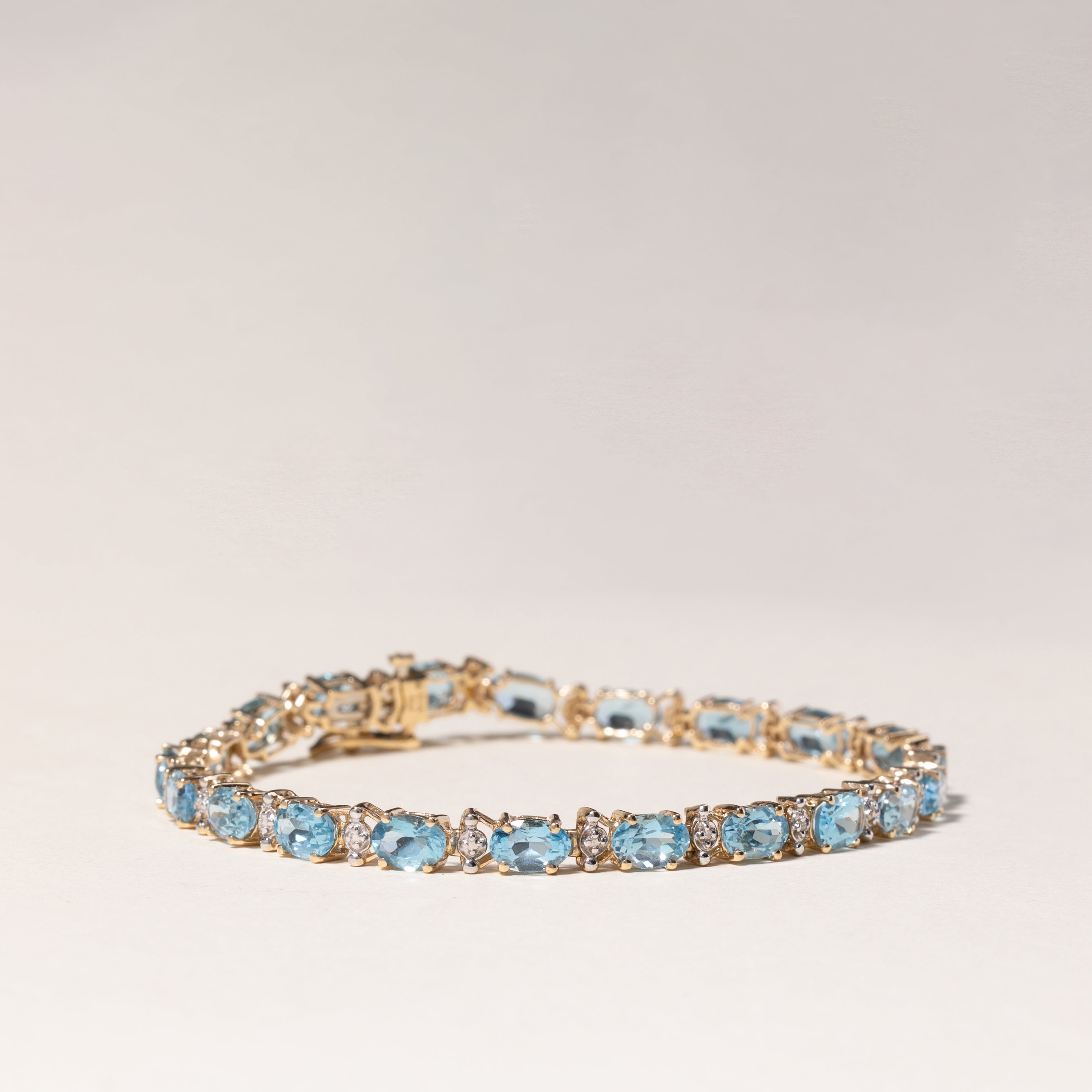 10K Yellow Gold Blue Topaz Bracelet - 10.29ctw Gemstone Jewelry with 0.01ctw Diamonds | 7.25