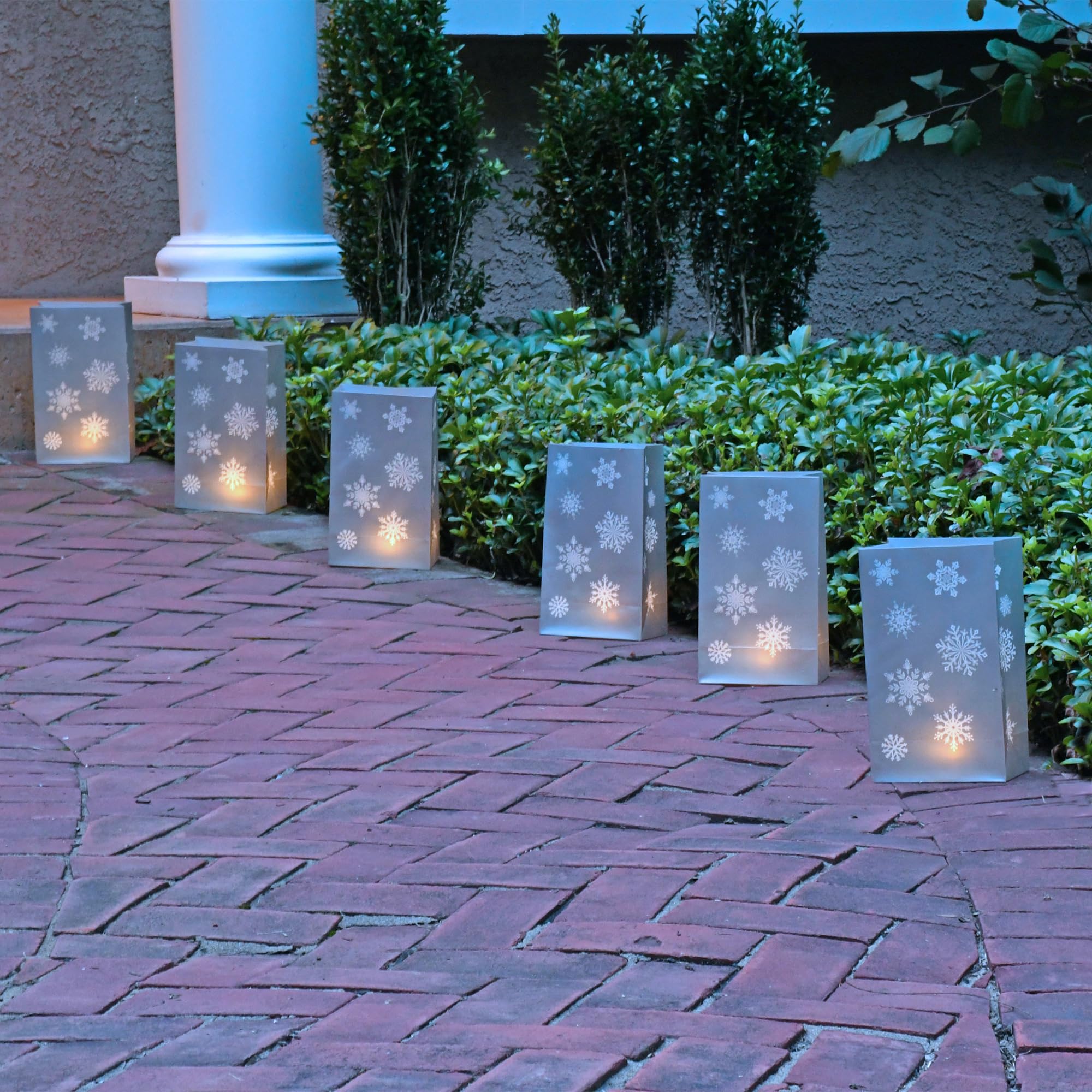 LumaBase Battery Operated Luminaria Kit with Timer - Silver Snowflake Design - Set of 6 Outdoor Christmas Decorations for Pathway, Garden, and Holiday Lighting