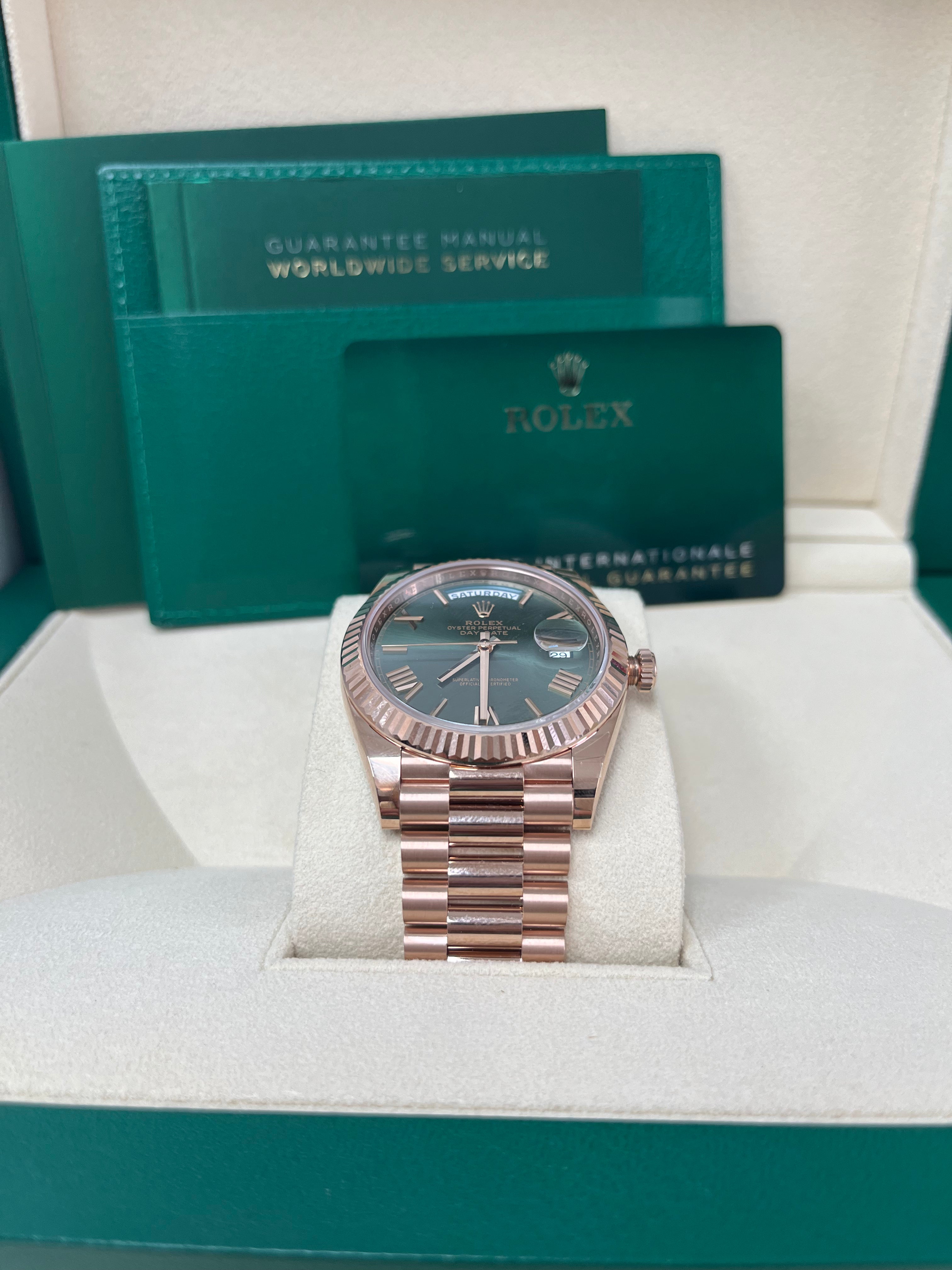 Rolex Day Date 40 Rose Gold Watch with Green Roman Dial & Fluted Bezel (Ref#228235) - Luxury Dress Watch for Business & Formal Occasions