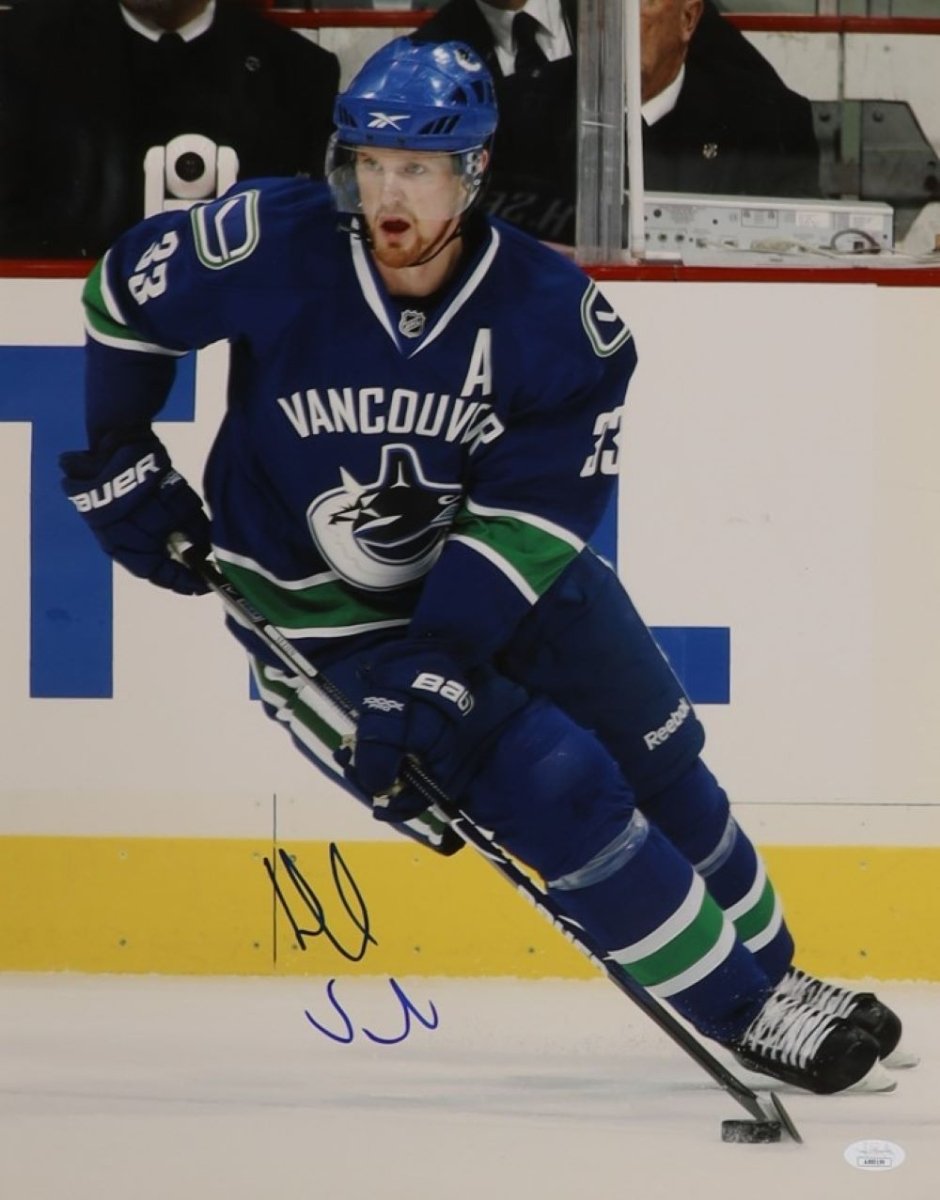 Henrik Sedin Autographed 16x20 Vancouver Canucks Photo with JSA COA - Perfect for Hockey Fans, Sports Memorabilia Collectors & Man Cave Decor