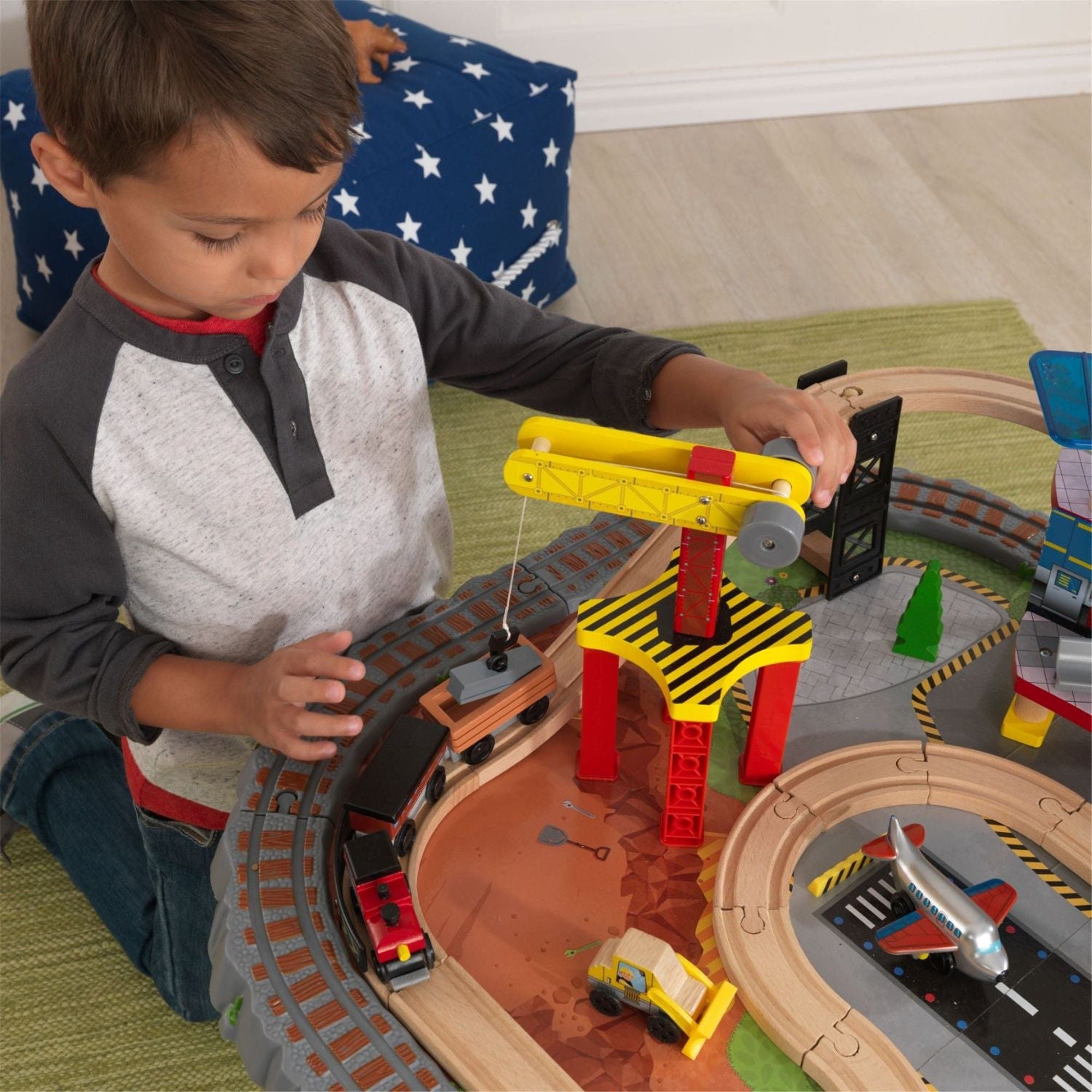 KidKraft Transportation Station Wooden Train Set & Play Table for Kids - Perfect for Imaginative Play, Preschool Learning & Toddler Room Decor