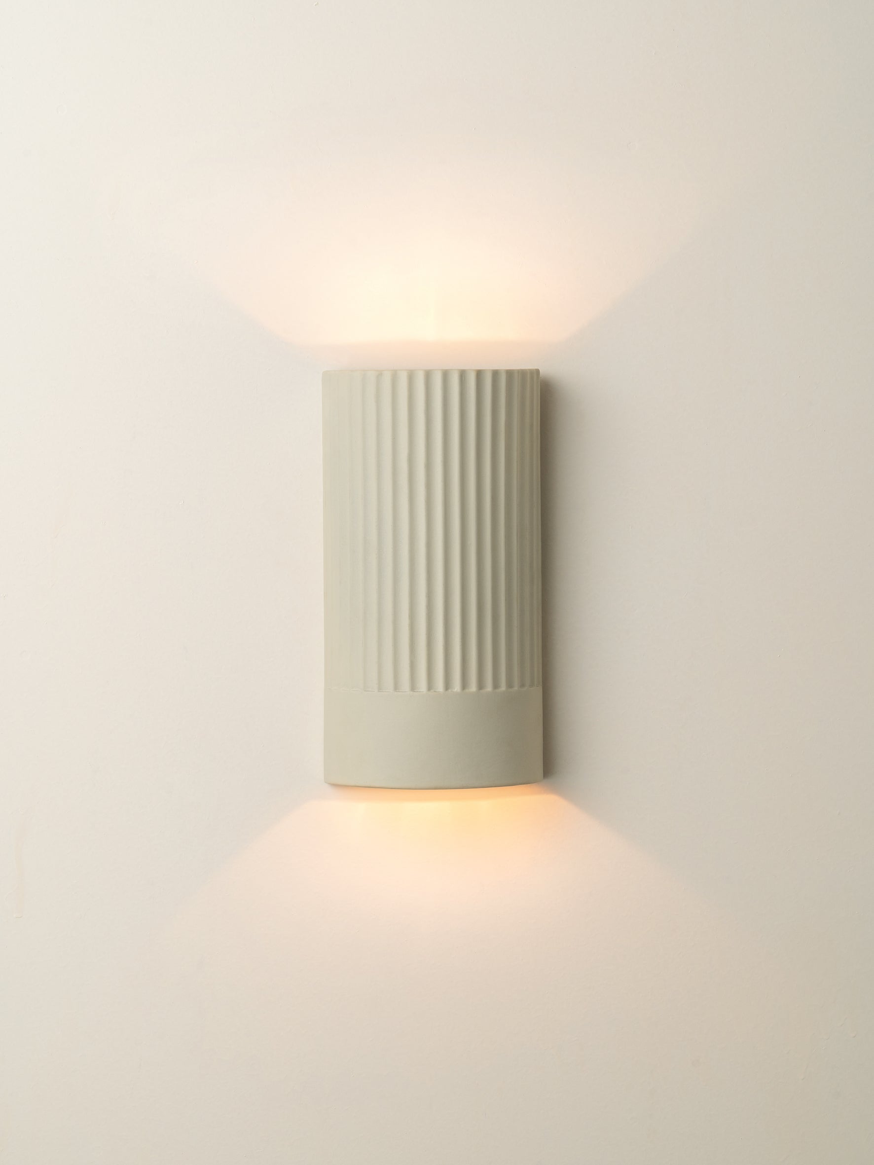 Enza Warm White Ribbed Ceramic Wall Light - Elegant Indoor/Outdoor Lighting for Living Room, Bedroom, Patio & Hallway