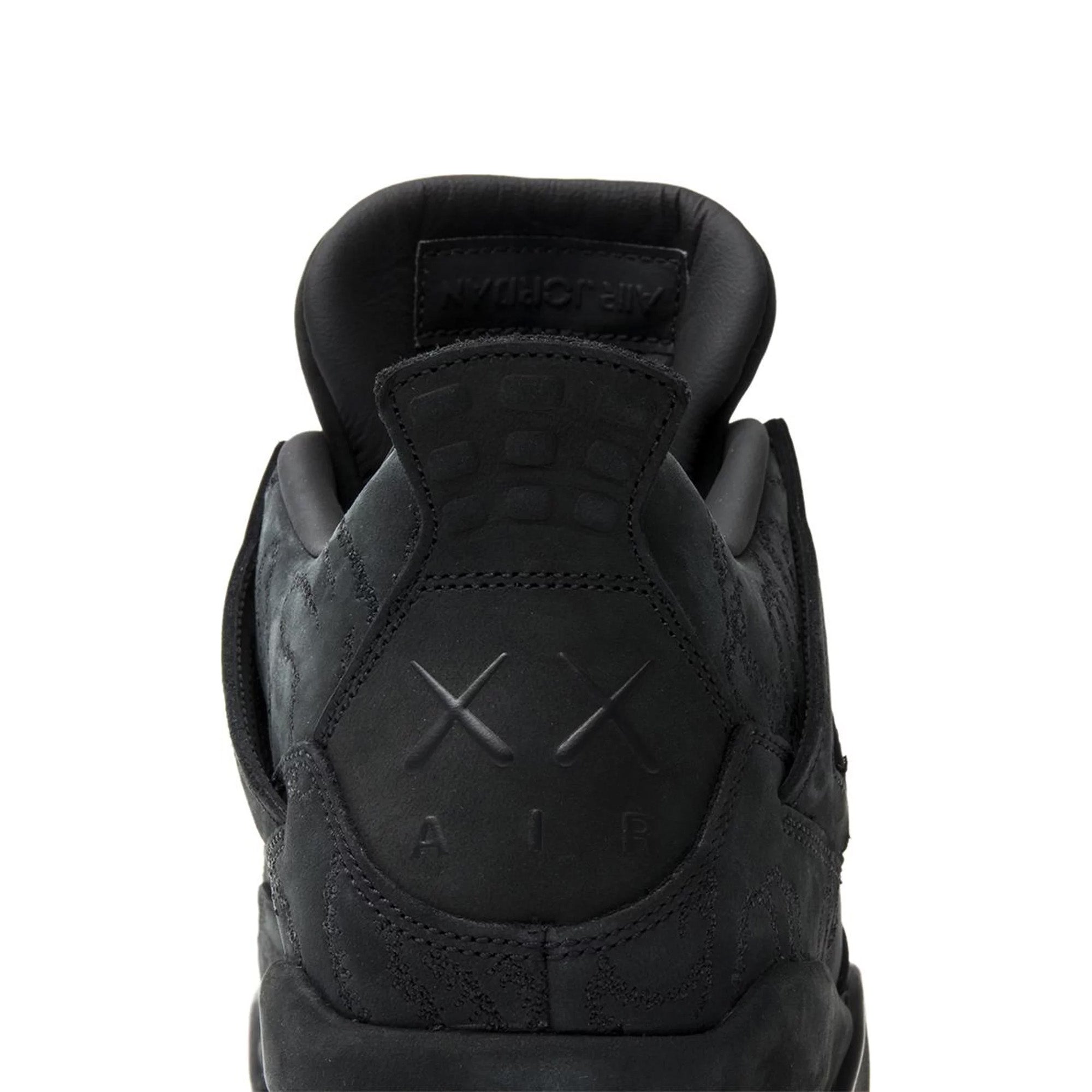 Air Jordan 4 Retro 'Kaws Black' Sneakers (2017) - Men's Limited Edition Basketball Shoes for Streetwear & Sneaker Collectors