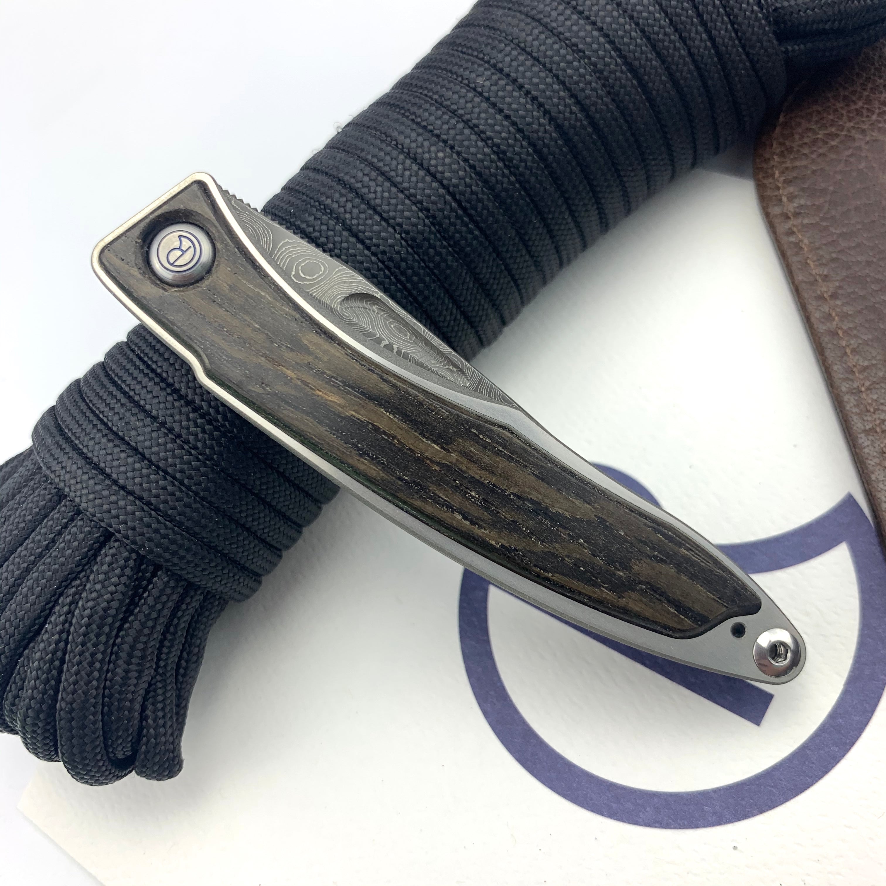 Chris Reeve Knives Mnandi Left Hand Bog Oak Folding Knife with Raindrop Damascus Blade - Premium EDC Pocket Knife for Outdoor, Camping & Everyday Carry