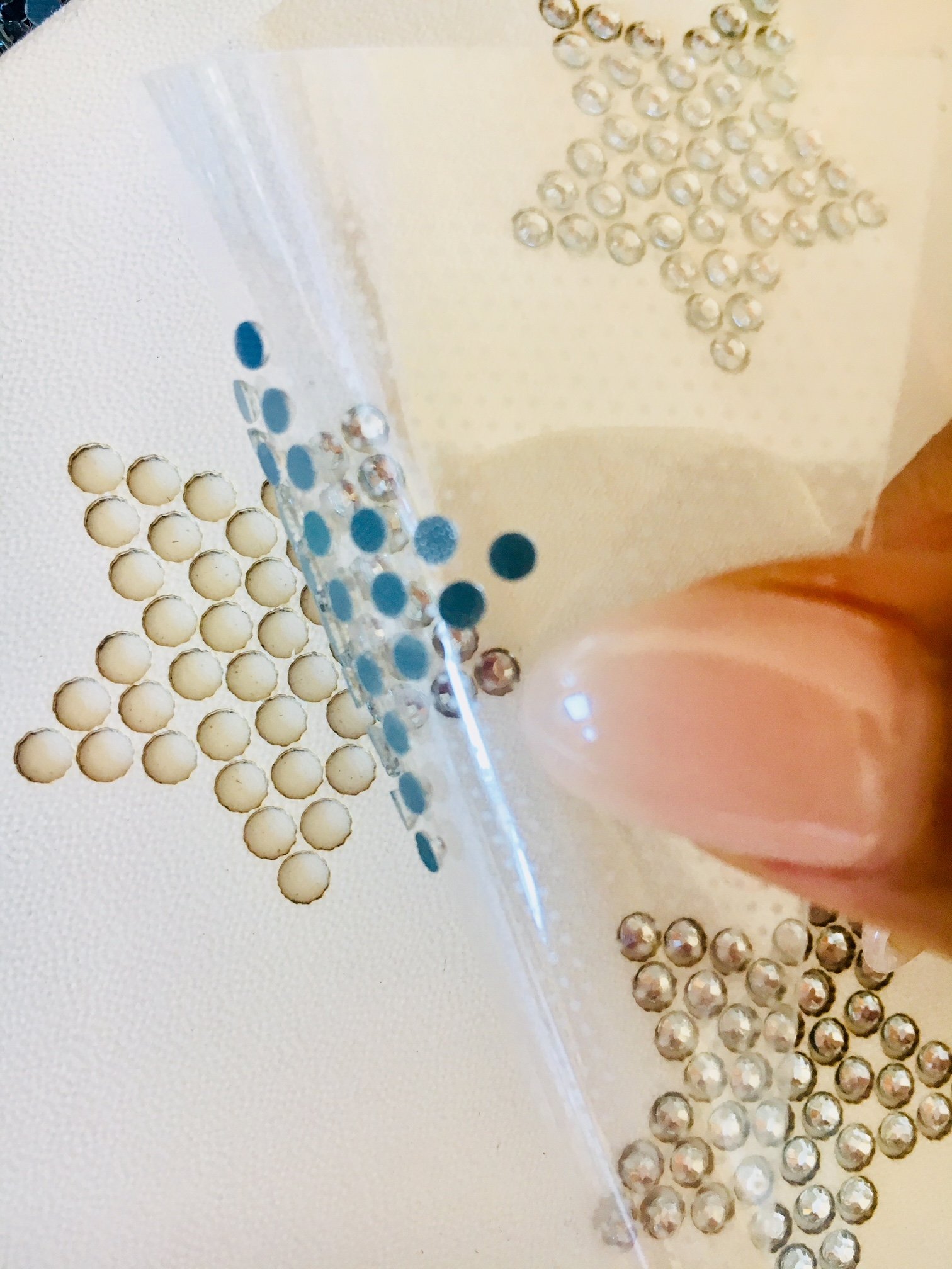 9-Piece Small Clear Rhinestone Iron-On Transfer Stars for DIY Clothing & Accessories - Perfect for T-Shirts, Hats, Bags & More