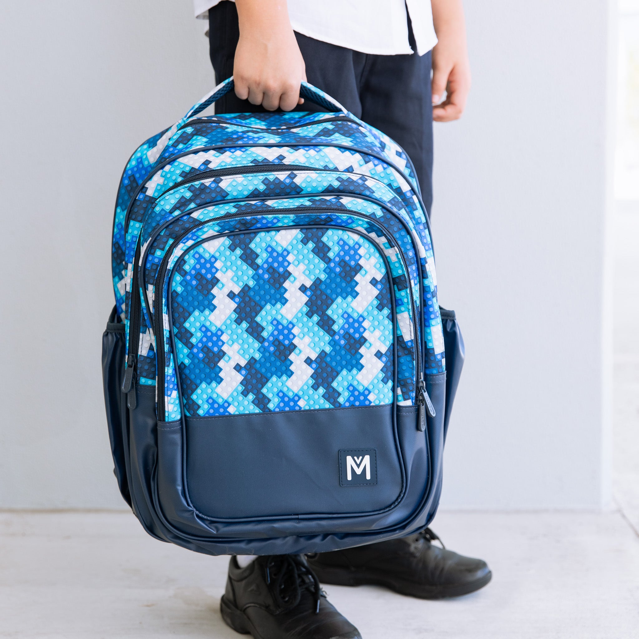 Montii.Co Waterproof Travel Backpack with Anti-Theft Design - Lightweight & Durable for Hiking, Commuting, and Daily Use