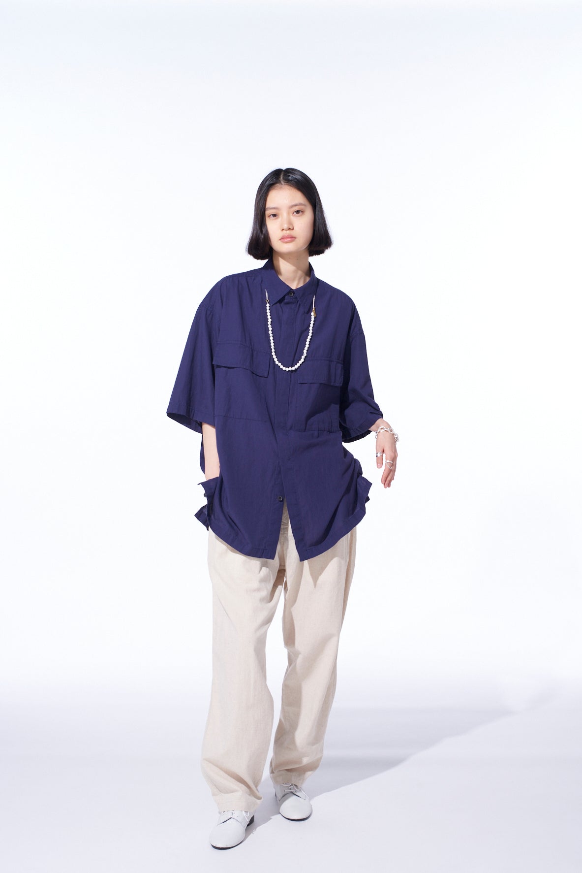 Stylish Oversized Short Sleeve Chambray Shirt with Flap Pockets - Casual Summer Wear for Women & Men | Perfect for Beach Outings, Picnics, and Weekend Getaways