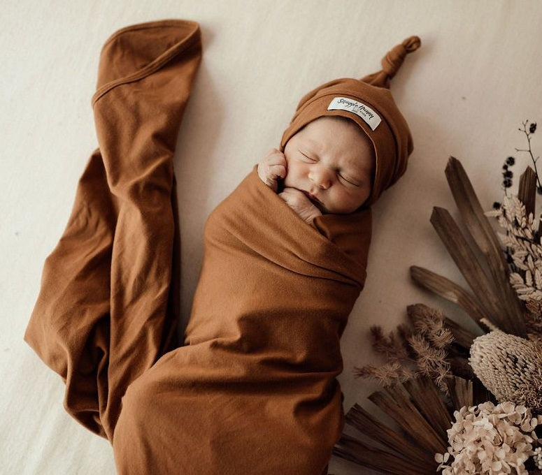 Snuggle Hunny Baby Jersey Wrap & Beanie Set - Soft Cotton Newborn Swaddle Blanket and Hat - Perfect for Hospital Photos, Baby Showers & Cozy Nursery Time (Bronze)