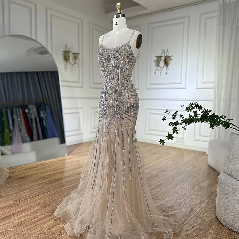 Elegant Silver Nude Spaghetti Strap Mermaid Evening Gown with Beaded Tassels - Dubai Luxury Formal Dress for Prom, Gala & Special Occasions - LA72772