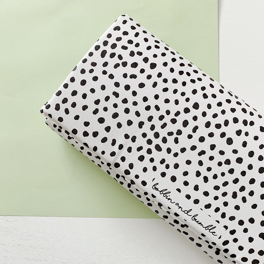 Portable Baby Changing Mat with Black Spotty Print - Waterproof & Foldable for Diaper Changes at Home, Travel, and On-the-Go