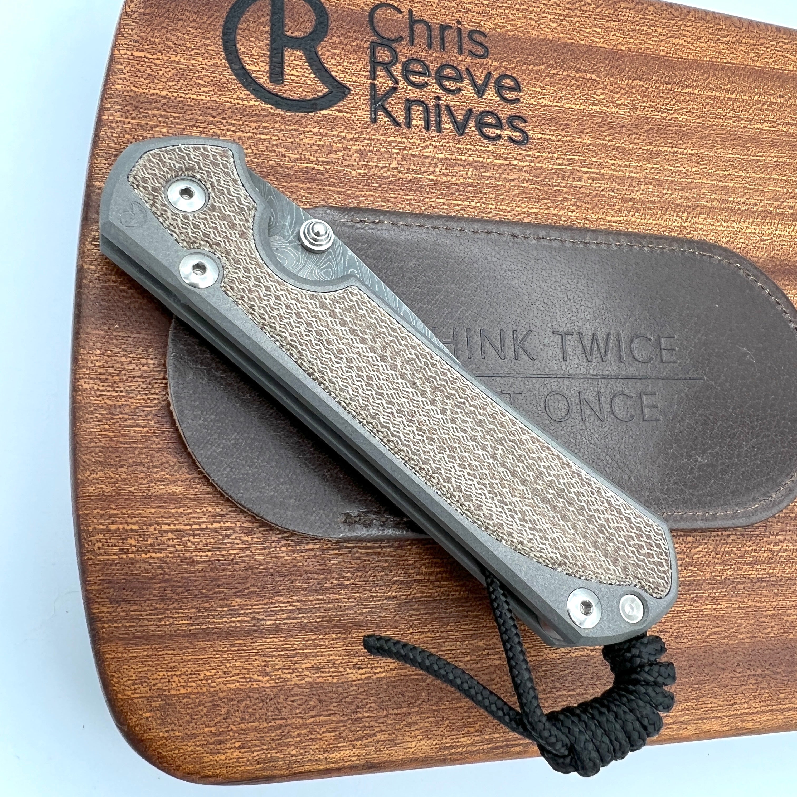 Chris Reeve Knives Large Sebenza 31 Drop Point Folding Knife - Boomerang Damascus Blade, Left-Hand Natural Canvas Micarta Inlay & Double Silver Lug - Perfect for Outdoor Camping, Hunting, and EDC Collection