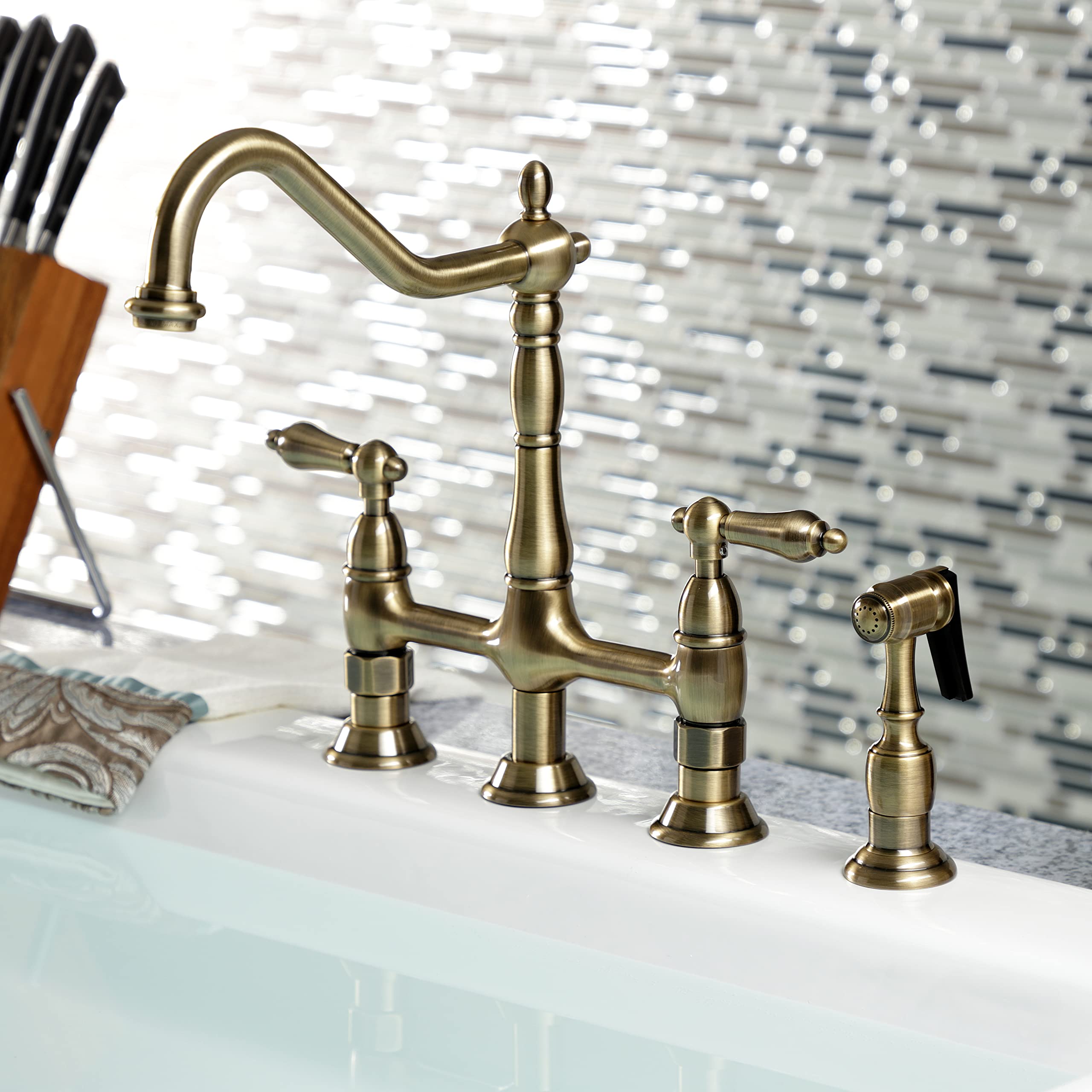 Kingston Brass KS1273ALBS Heritage 8-Inch Kitchen Bridge Faucet with Brass Sprayer - Antique Brass Finish - Perfect for Farmhouse, Vintage & Traditional Kitchen Sinks