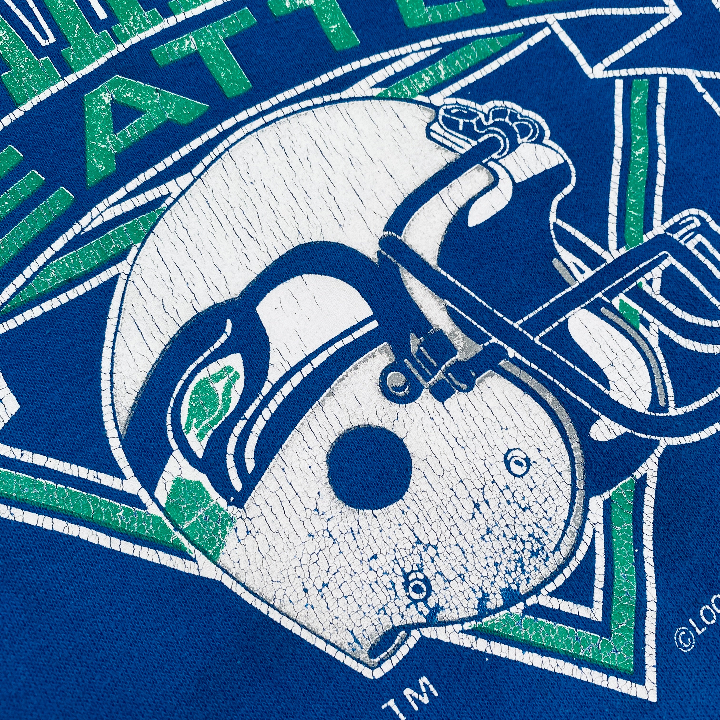 Seattle Seahawks Vintage 1990s Logo 7 Graphic Spellout Sweatshirt (Small) - Perfect for Game Day, Sports Fans & Retro Fashion Enthusiasts