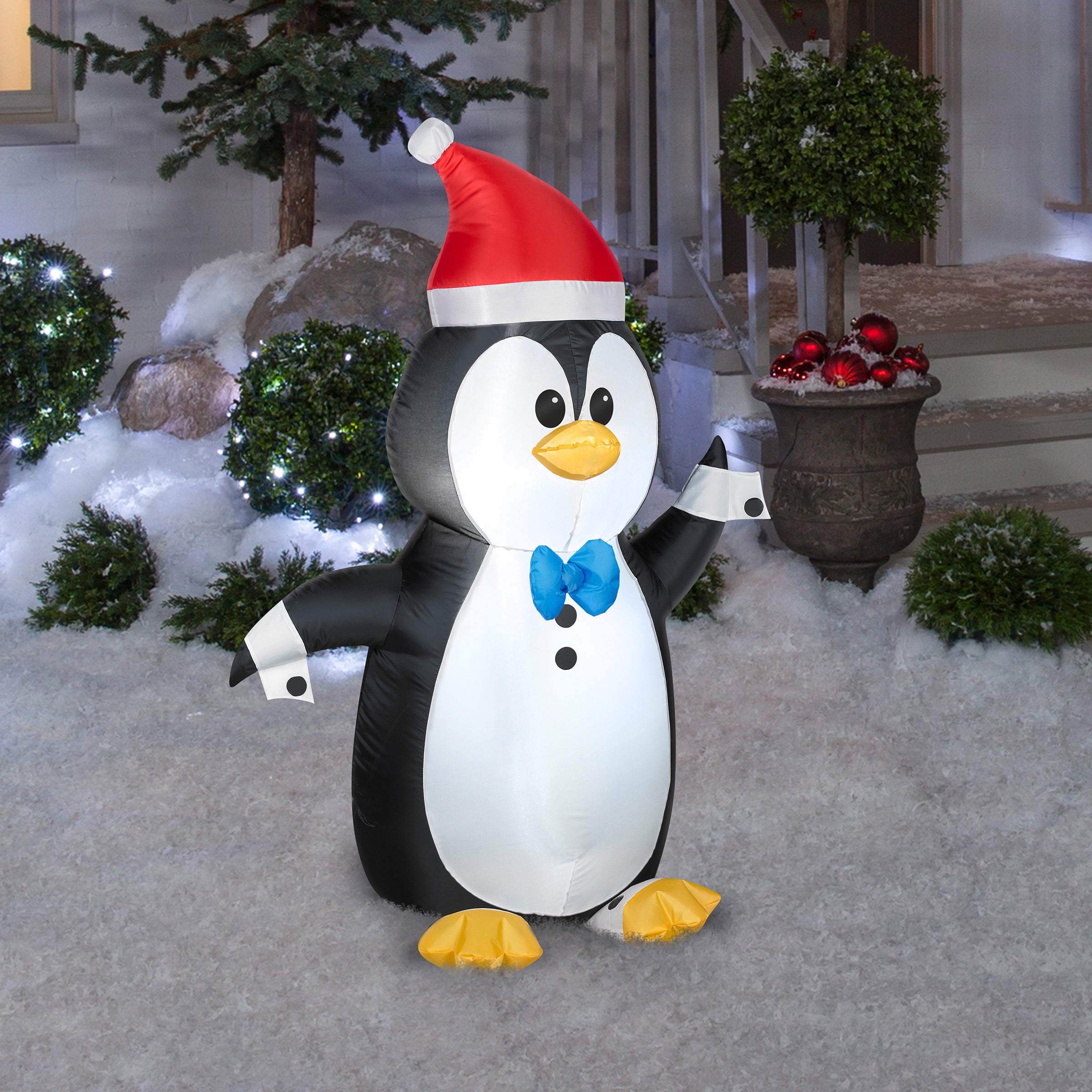 4 ft. LED Inflatable Waving Penguin for Outdoor Christmas Decorations, Holiday Yard Decor, and Party Decorations