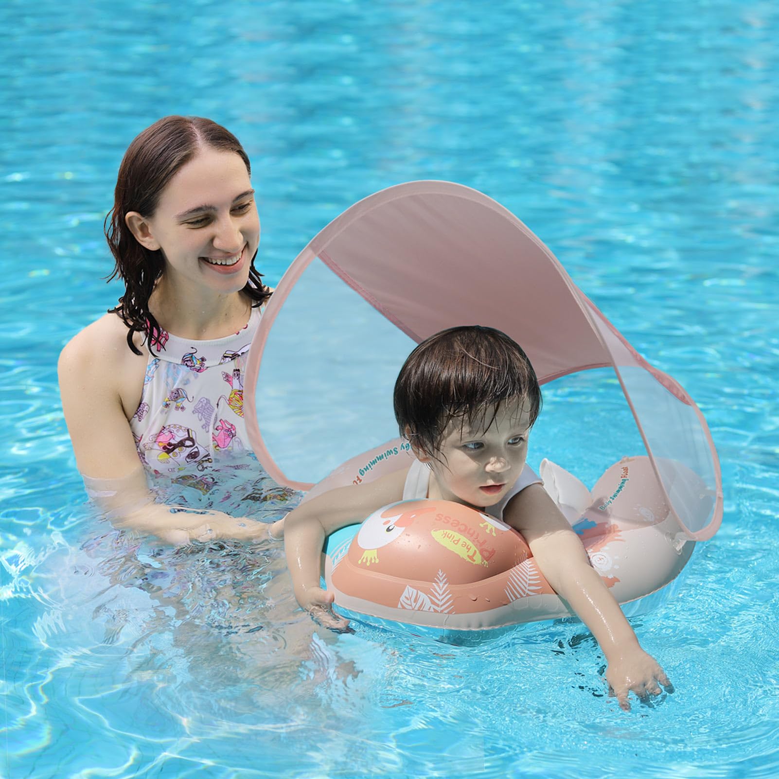 **Inflatable Baby Pool Float with Sun Canopy & Safety Sponge Bottom - Large Pink Infant Swimming Trainer for Toddlers, Water Play & Learning to Swim**
