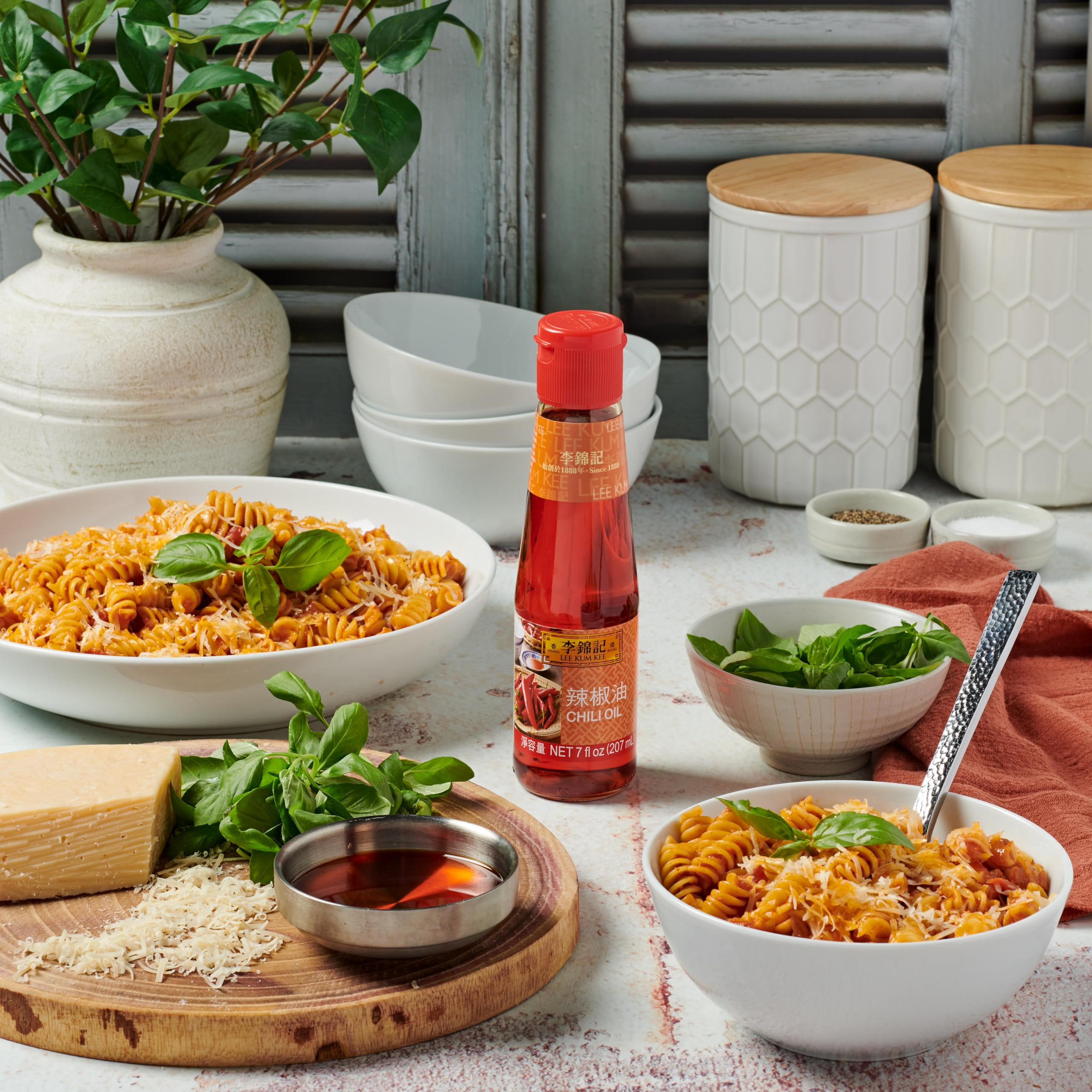 Lee Kum Kee Chili Oil 7 oz - Premium Spicy Chili Oil Made with Dried Chili Peppers & Soybean Oil - Hot Sauce for Dipping, Cold Dishes, Sichuan & Hunan Cuisine - Perfect for Noodles, Dumplings & Stir-Fry