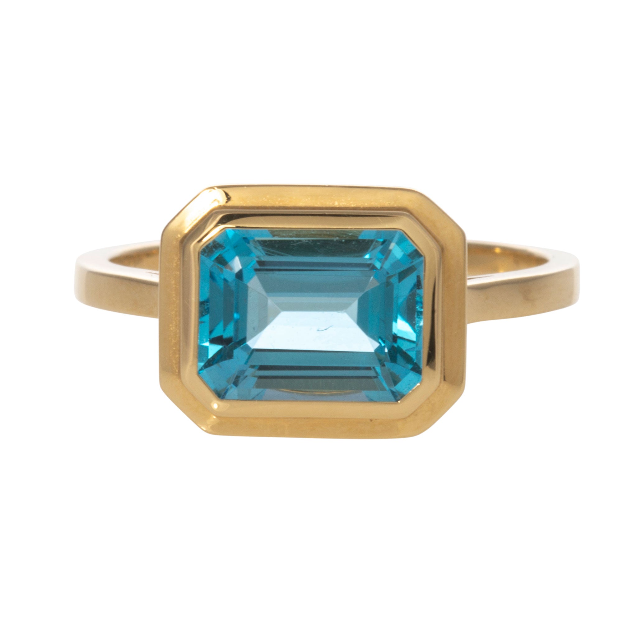 Goshwara Emerald Cut Blue Topaz Bezel Set 18K Gold Ring for Women | Elegant Wedding, Engagement & Anniversary Jewelry Gift