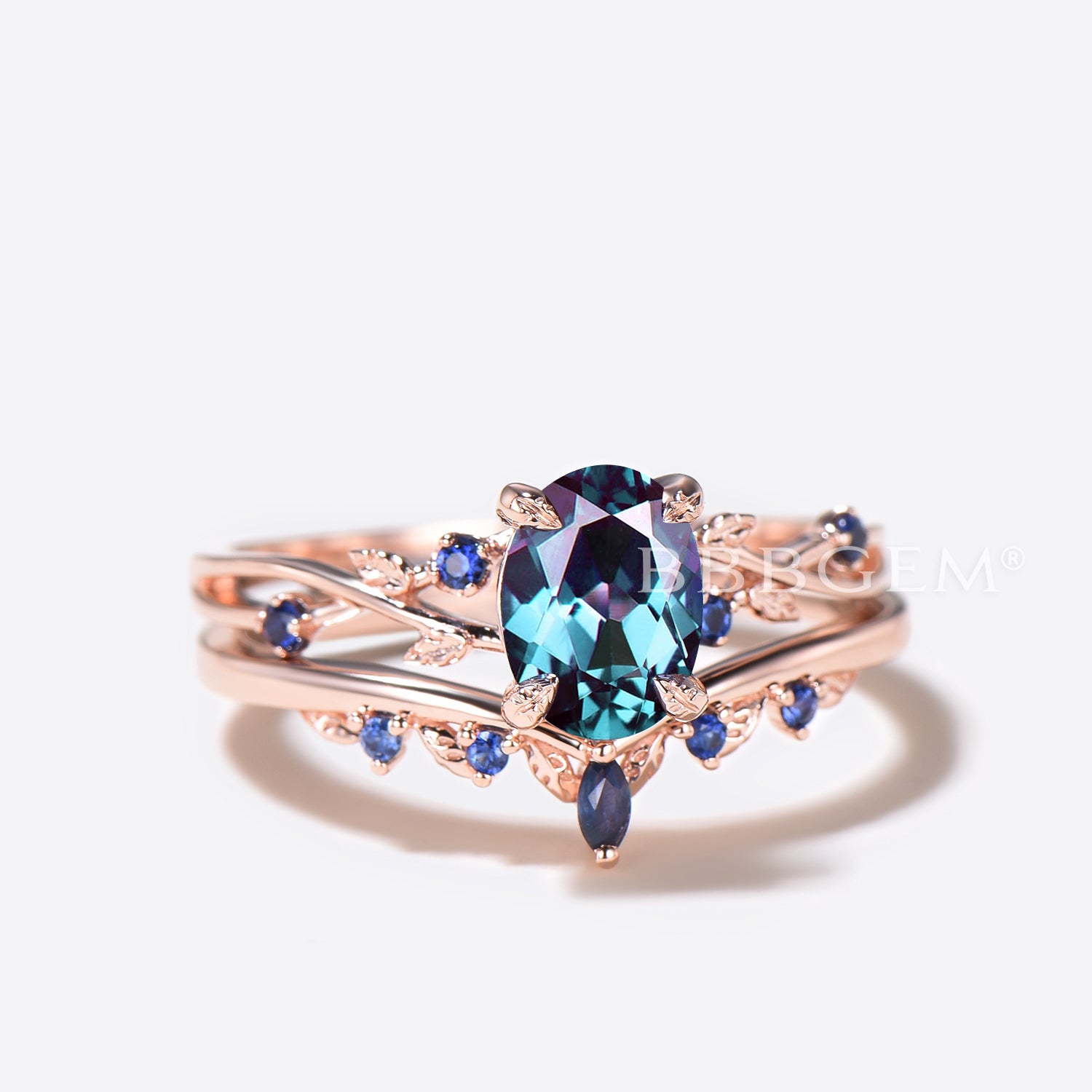 Twisted Vine Oval Color Changing Alexandrite Ring with Leaf Design & Blue Sapphire Accents – Perfect for Weddings, Anniversaries, and Special Occasions