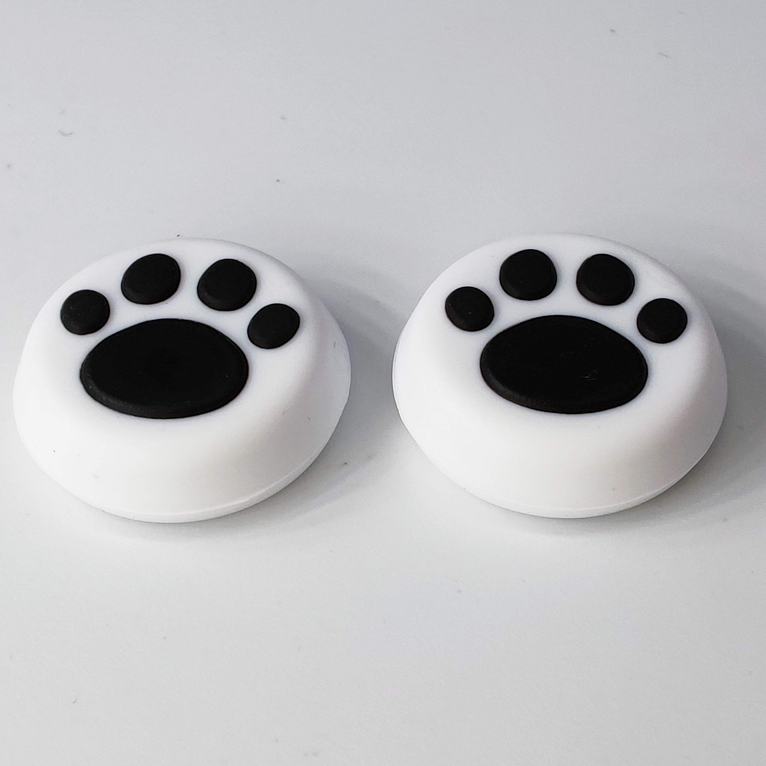 2PCS Analog Stick Thumb Grips for PS5/PS4/PS3/Xbox One/Xbox 360/PS2/Switch Pro/Wii U Controllers - Non-Slip Paw Design (White & Black) - Improve Gaming Comfort & Grip for Long Play Sessions