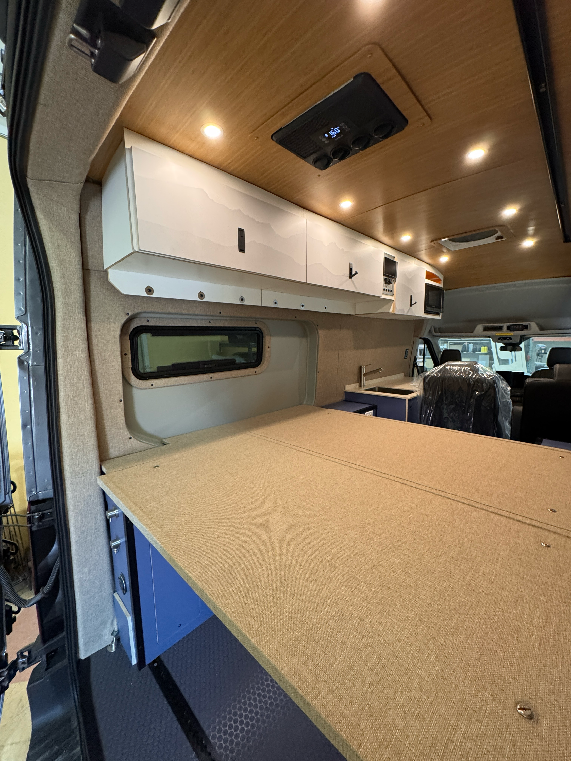 Ford Transit Innie Sleeper - Driver Side Sleeper Conversion Kit for Camper Vans | Comfortable Sleeping Solution for Road Trips & Camping Adventures