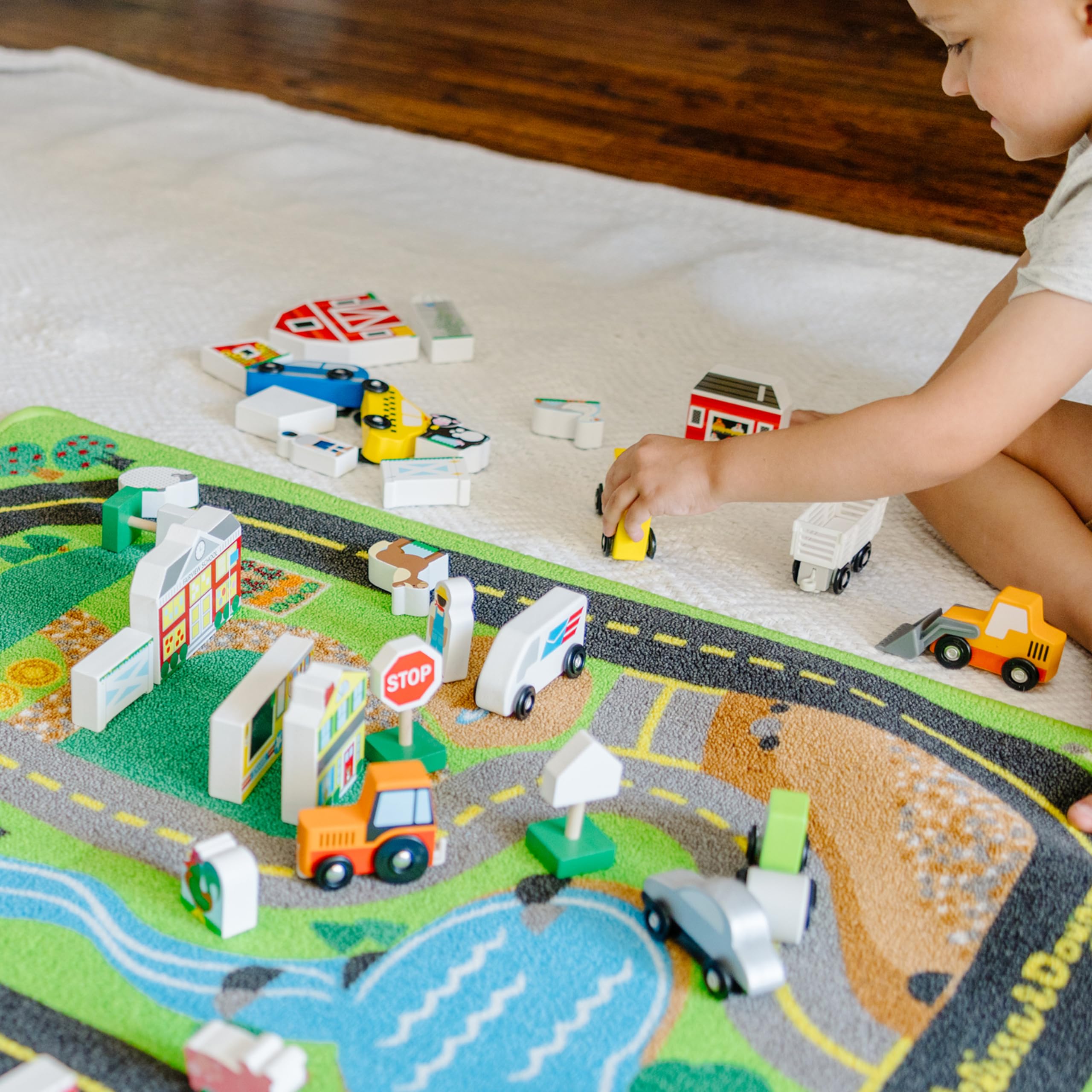 Melissa & Doug Deluxe Activity Road Rug Play Set with 49 Wooden Vehicles & Play Pieces – Interactive Toy for Kids, Perfect for Pretend Play, Learning & Indoor Fun