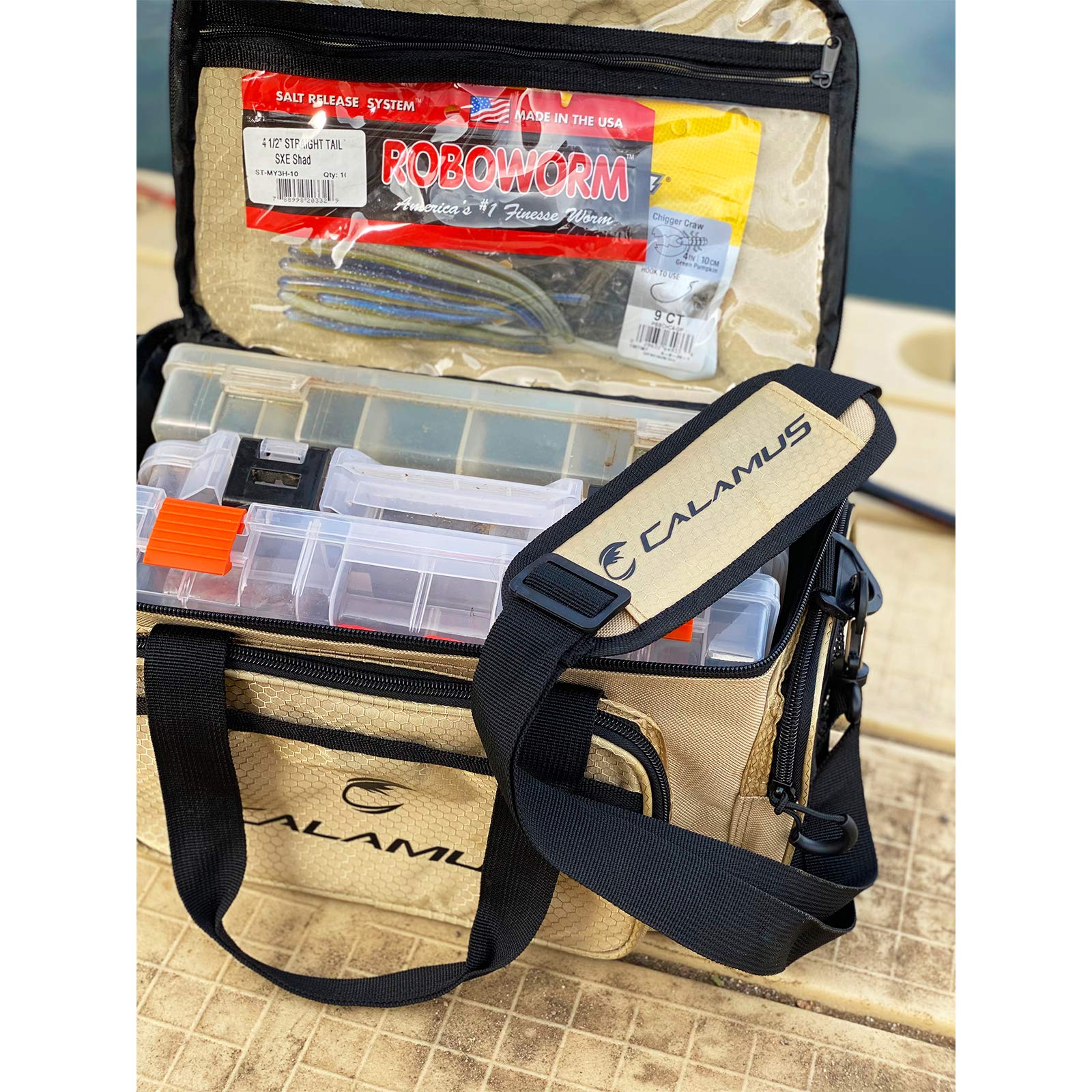 **Calamus Fishing Tackle Bag - Durable Rip-Stop PE Saltwater & Freshwater Fishing Gear - Padded Shoulder Strap & Pliers Storage - Khaki - Perfect for Shore, Boat, and Kayak Fishing**