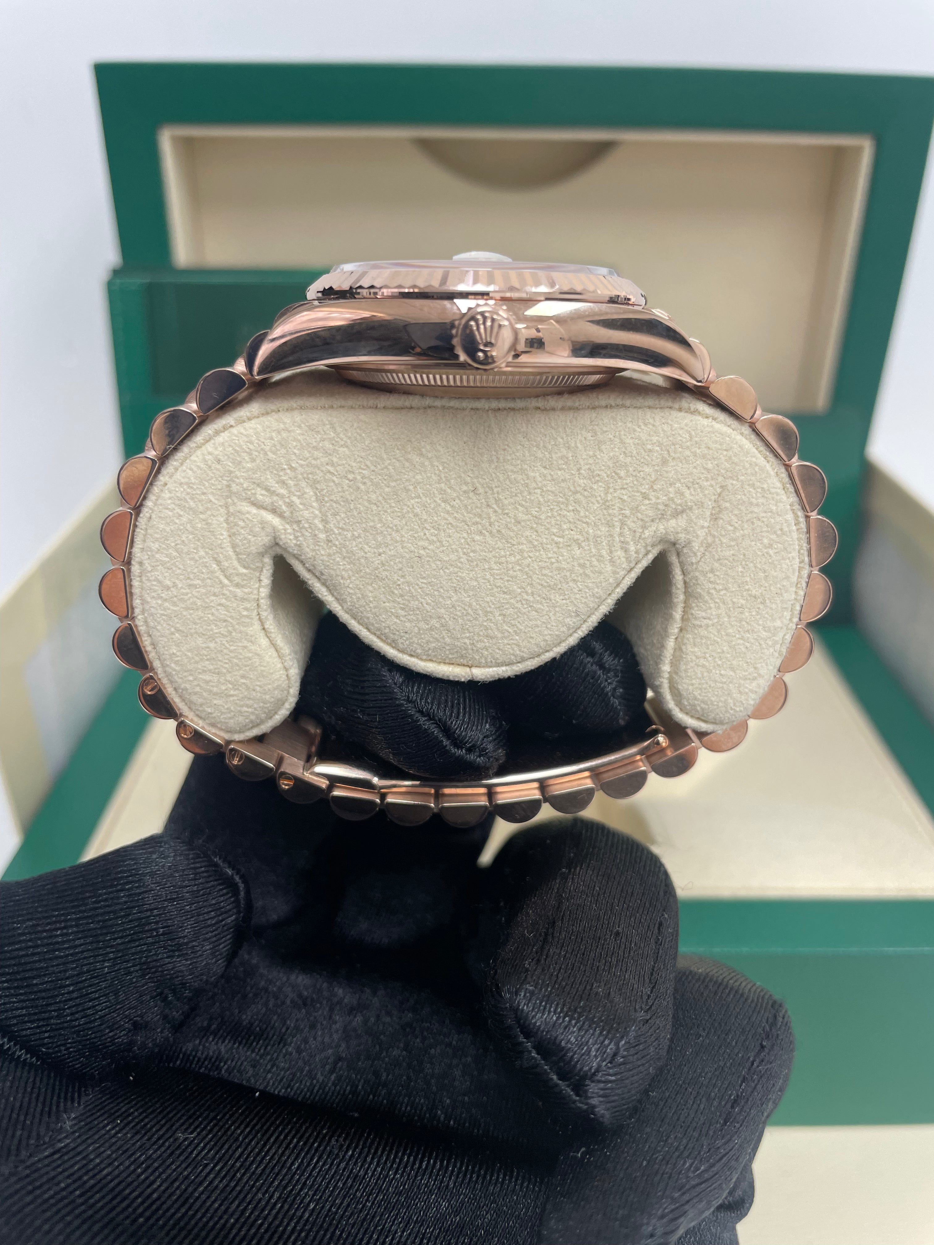Rolex Everose Gold Day Date 36 Watch with Fluted Bezel & White Roman Dial - President Bracelet Ref# 128235 | Luxury Dress Watch for Business & Formal Occasions