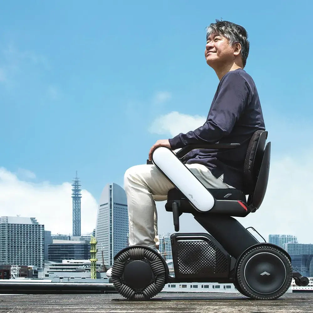 Whill Model C2 Power Wheelchair - Lightweight, Foldable Electric Mobility Scooter for Adults & Seniors - Indoor & Outdoor Use for Shopping, Travel & Daily Activities