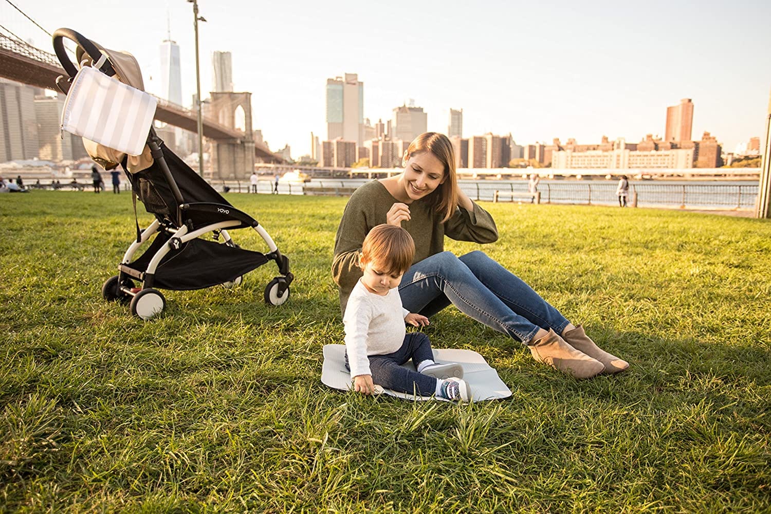 Ubbi On The Go Diaper Changing Mat and Bag - Portable Baby Changing Station for Travel, Gray | Perfect for Diaper Bags, Strollers, and On-the-Go Parents