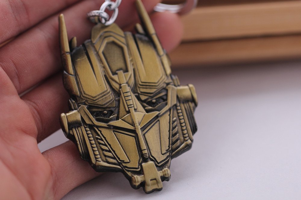Transformers Metal Keychain - Durable Car Key Ring Holder for Keys, Wallet & Backpack - Bronze Color - Perfect for Gifts & Collectibles