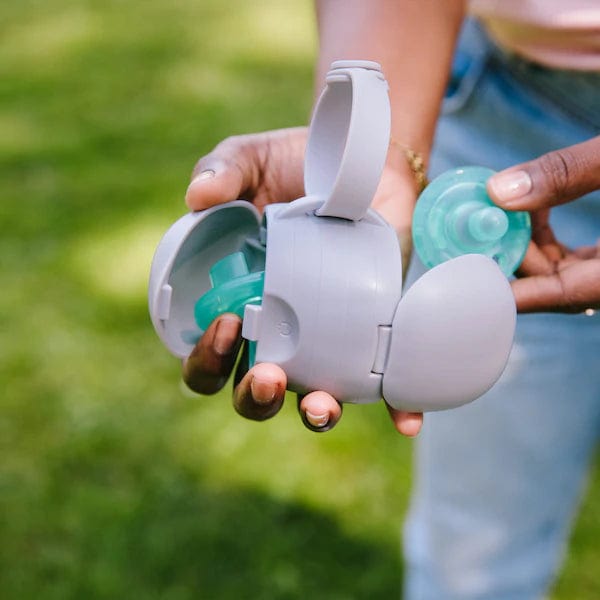 Ubbi On The Go Pacifier Holder - Baby Pacifier Clip with Secure Strap for Strollers, Car Seats & Diaper Bags - BPA-Free Silicone Teether for Newborns & Infants - Perfect for Travel, Outings & Everyday Use