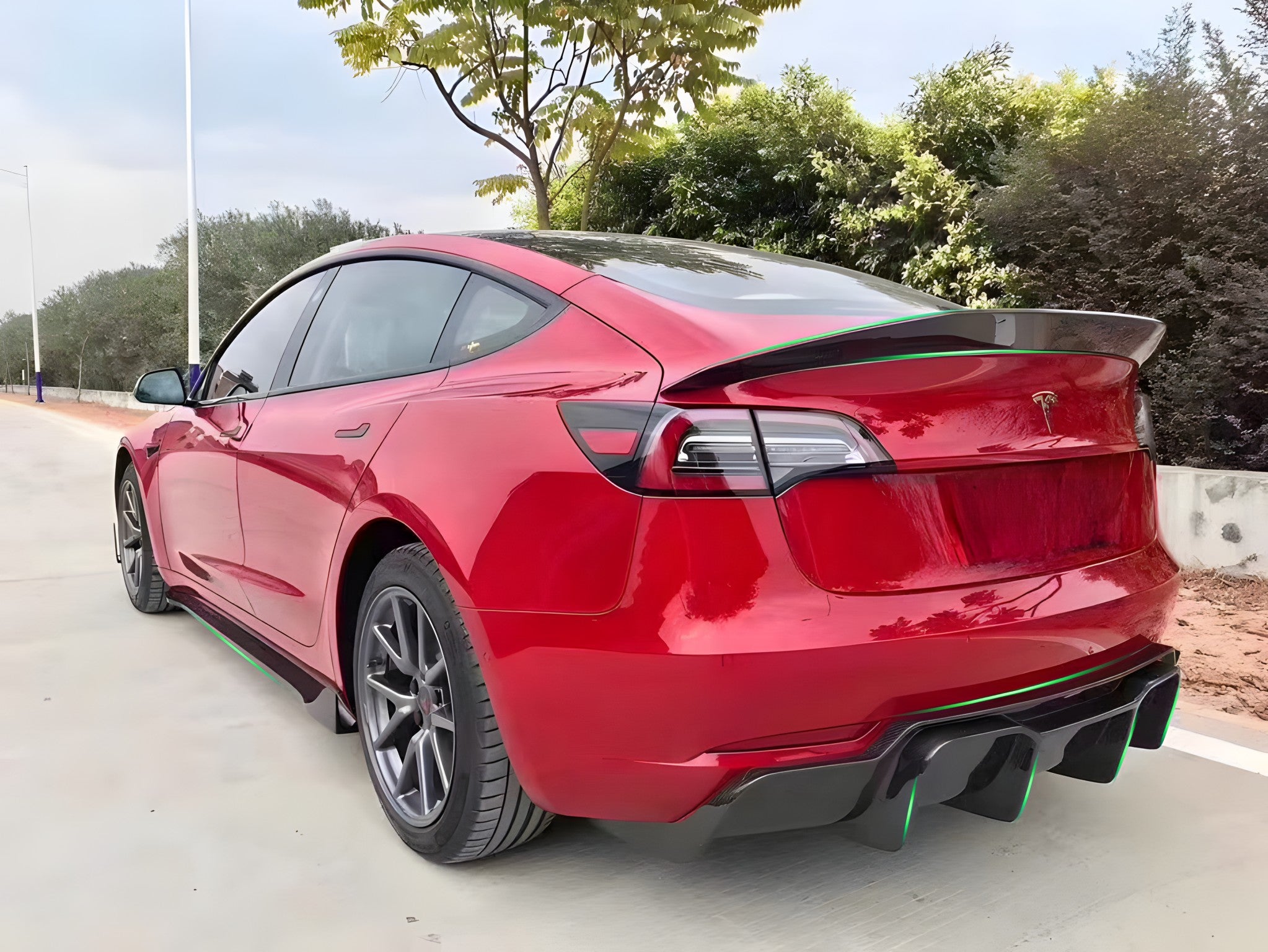 Premium Real Carbon Fiber V-Style Rear Diffuser for Tesla Model 3 (2017-2023) - Enhance Performance & Style for Sports Car Enthusiasts & Auto Modifiers