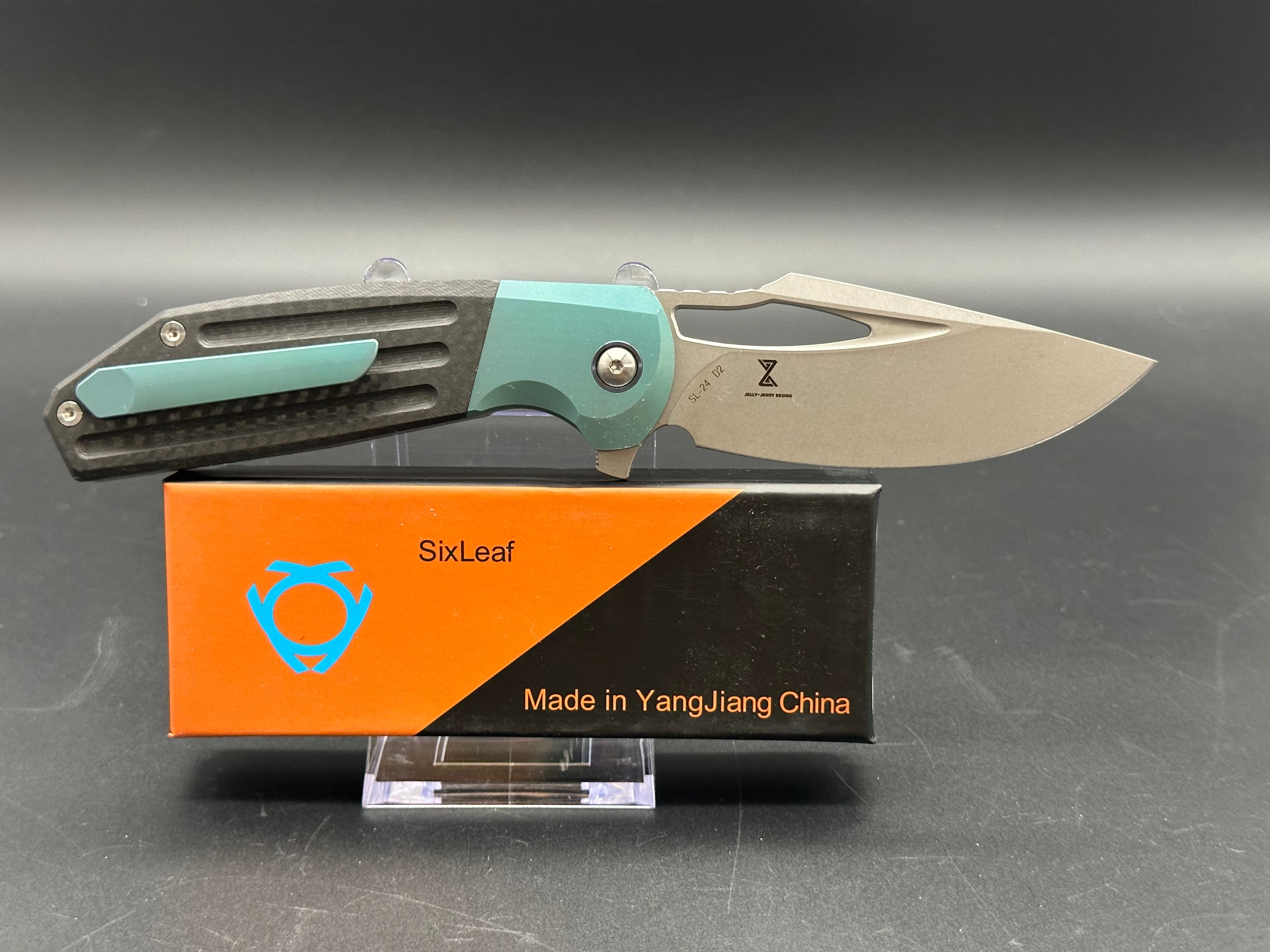 SIXLEAF SL 24 Jerry Jelly Pocket Knife - Plain Edge D2 Blade, Green Titanium Bolster & Carbon Fiber Handle - EDC, Camping, Hiking, Survival Gear
