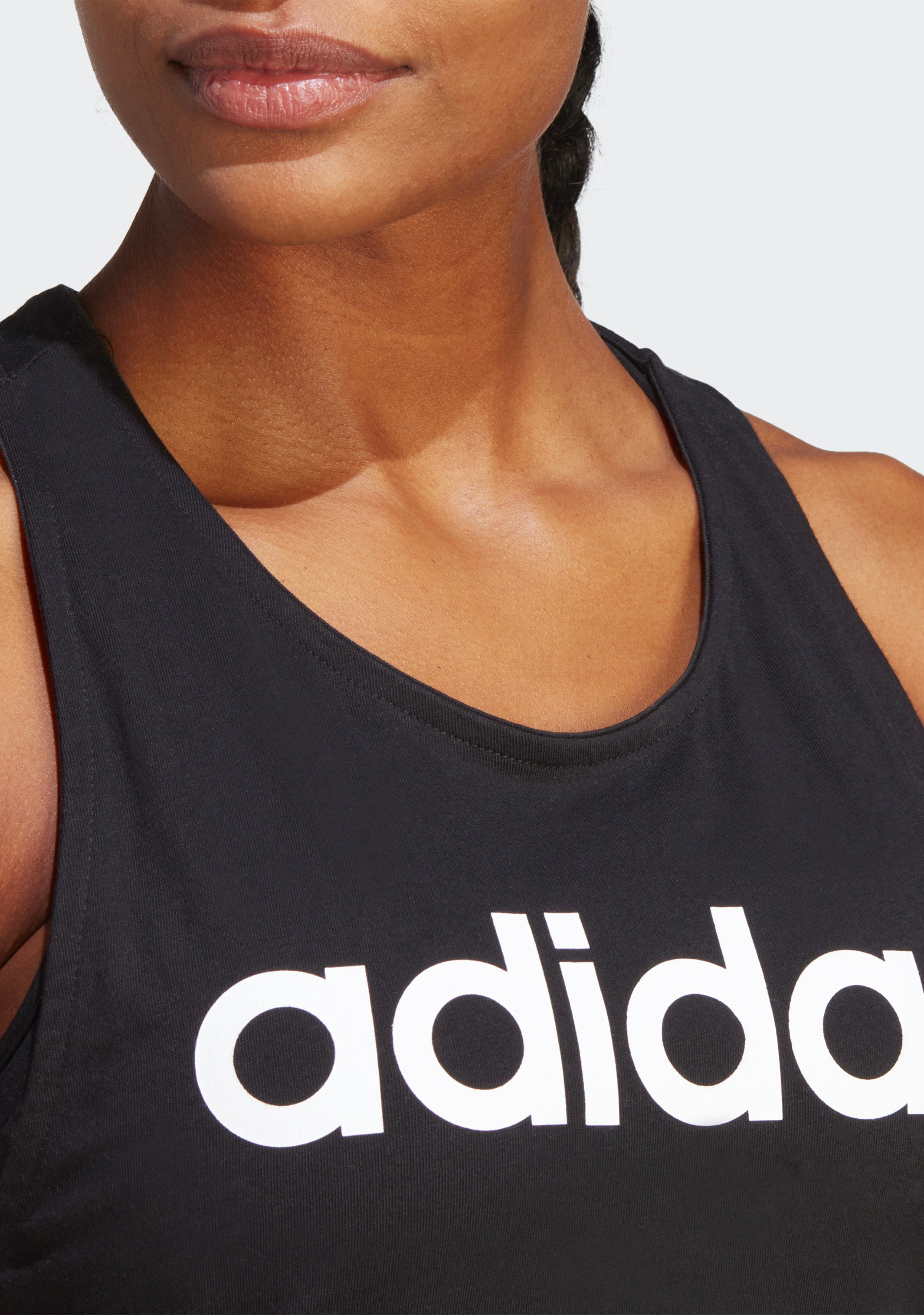 Adidas Women's Essentials Loose Fit Logo Tank Top - Breathable Workout Shirt for Running, Yoga & Gym - Comfortable Athletic Wear for Women