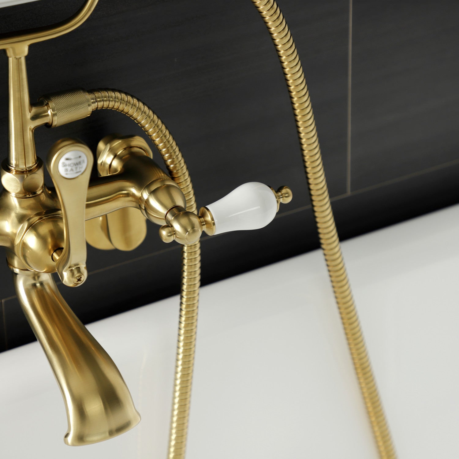 Vintage Style AE55T7 Three Handle 2 Hole Wall Mount Clawfoot Bathtub Faucet with Hand Shower in Brushed Brass - Perfect for Classic Bathroom Renovations and Luxury Spa Retreats