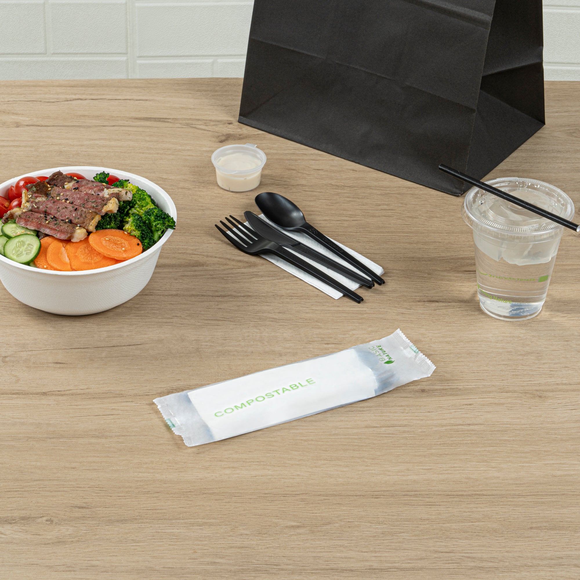 Eco-Friendly Black CPLA Plastic Cutlery Set - 100-Piece Compostable Utensils with Biodegradable Wrapper & White Napkins | Heat Resistant 6.5