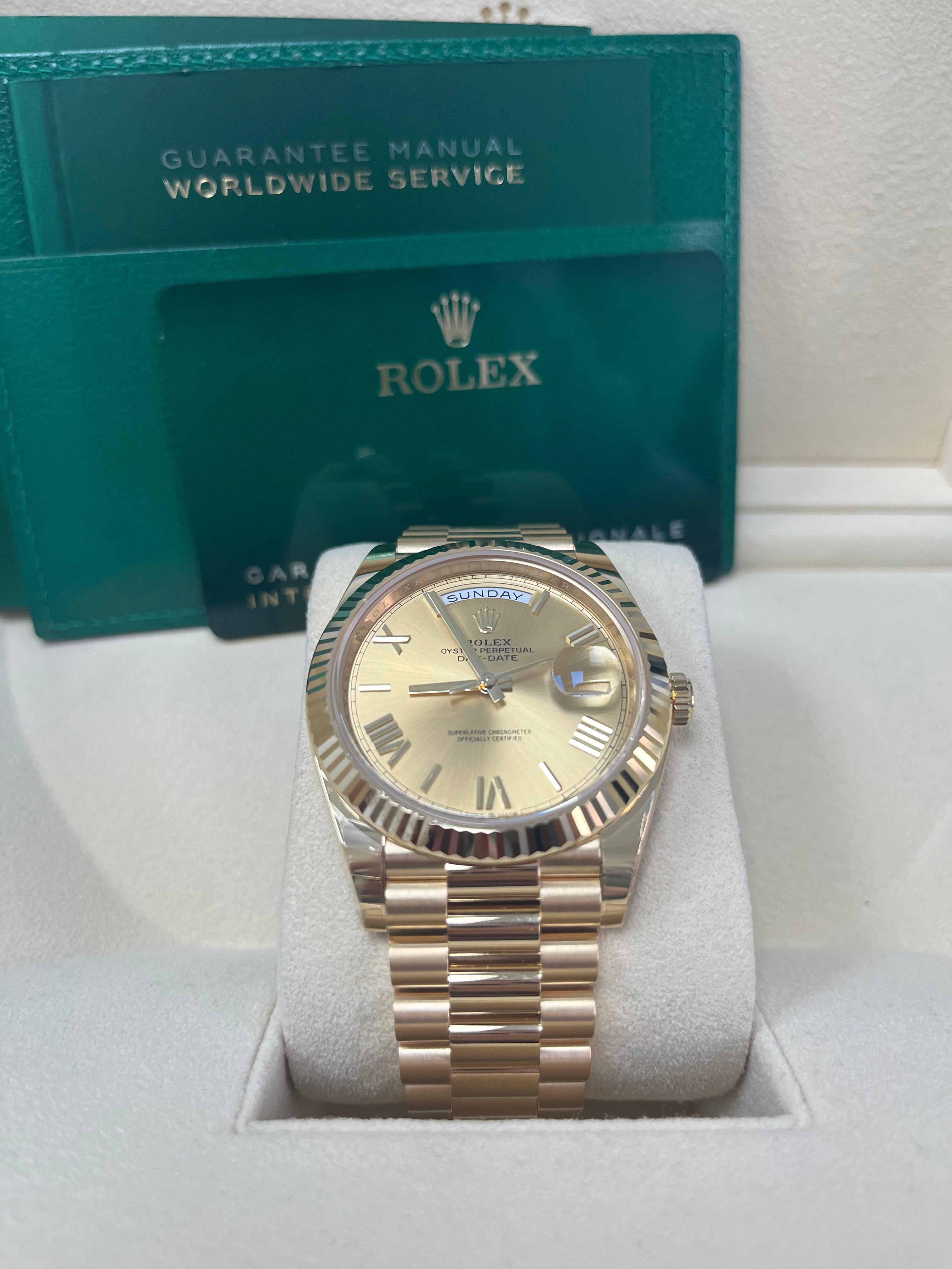 Rolex Day Date 40mm 18K Yellow Gold Men's Watch with Champagne Roman Dial & Fluted Bezel (Ref #228238) - Luxury Dress Watch for Business & Formal Occasions