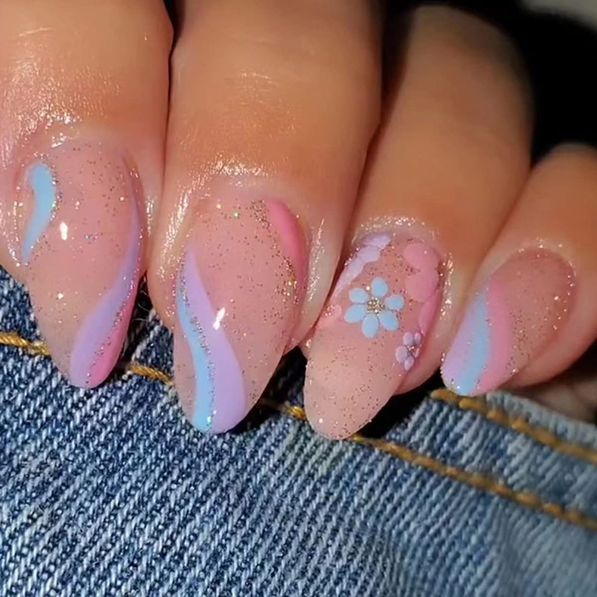 24Pcs Flower Press on Nails - Almond Fake Nails with Wave Lines & Small Floral Shiny Designs - Cute Acrylic Nails with Glitter Tips - Glossy Artificial Glue on Nails for Women & Girls - Perfect for Parties, Weddings, and Everyday Nail Decorations