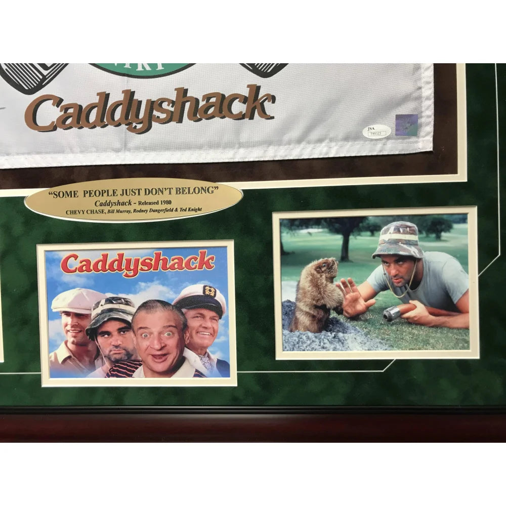Chevy Chase Signed Caddyshack Memorabilia - Autographed Flag Frame Collage with COA & JSA Certificate - Bushwood Country Club Collectible Pin - Perfect for Movie Fans & Sports Memorabilia Collectors