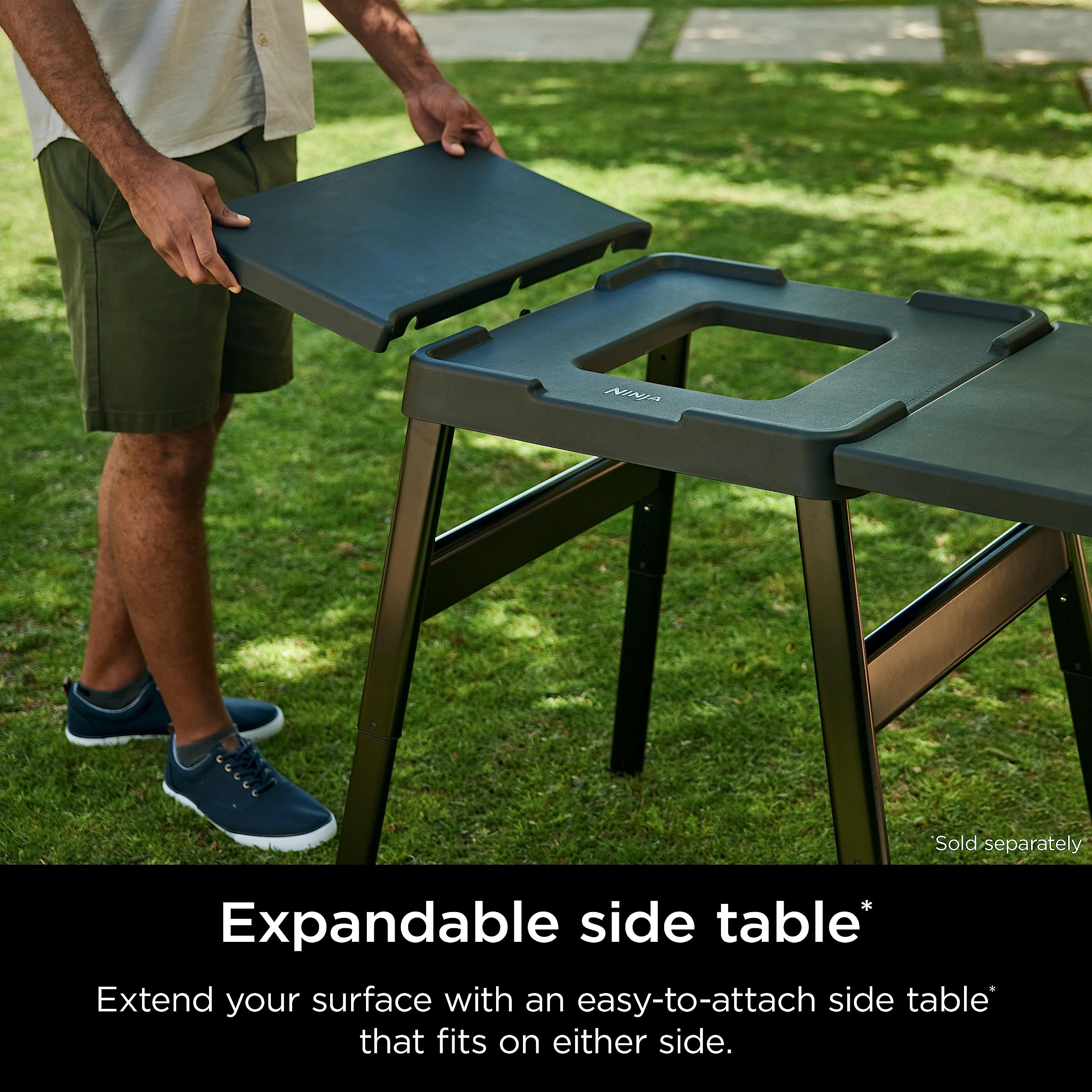 **Ninja XSKUNSTAND Outdoor Fire Pit Stand - Adjustable Height, Weather-Resistant Black Woodfire Stand with Utensil Holder & Side Table Compatibility (26