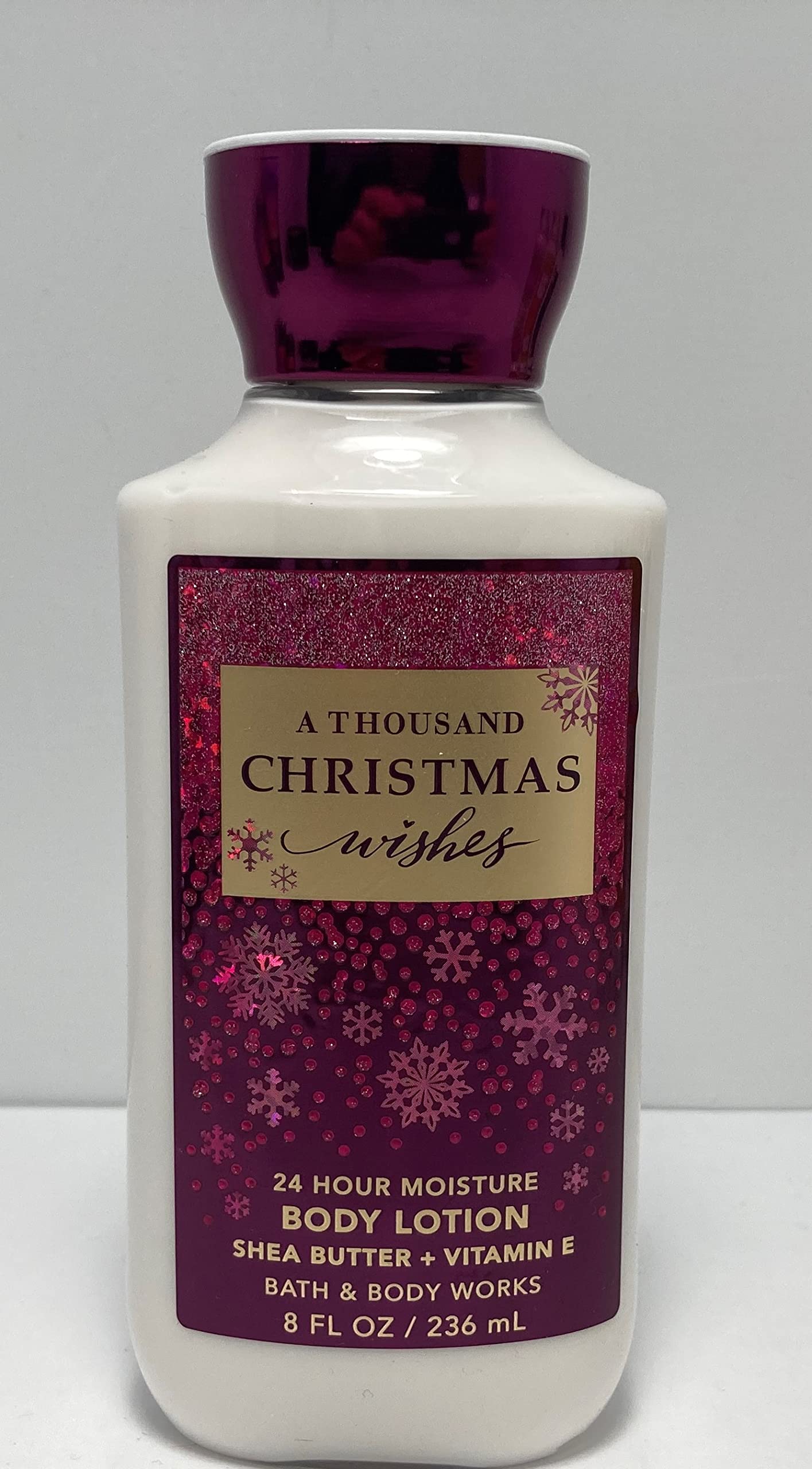 Bath & Body Works A Thousand Christmas Wishes 24-Hour Moisturizing Body Lotion - 8 oz Limited Edition Holiday Scent | Perfect for Winter Dry Skin & Christmas Gift Giving