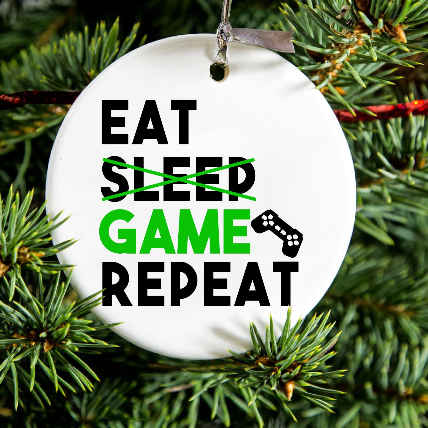 DistinctInk Hanging Ceramic Christmas Tree Ornament with Gold String - 2.75 Inch Holiday Decoration - Perfect Gift for Gamers (Eat Game Repeat Design) - Ideal for Christmas Tree Decor, Stocking Stuffers & Video Game Lover Presents